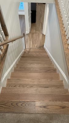 Harwood installation and refinish throughout