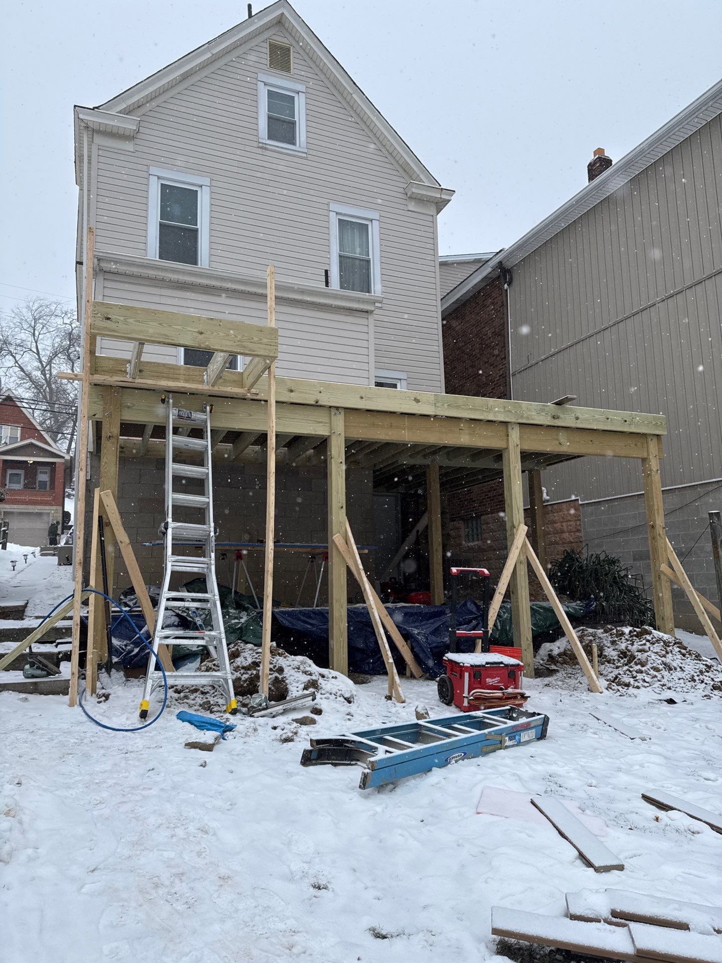 Deck and door by Cousins Roofing Siding & Decks