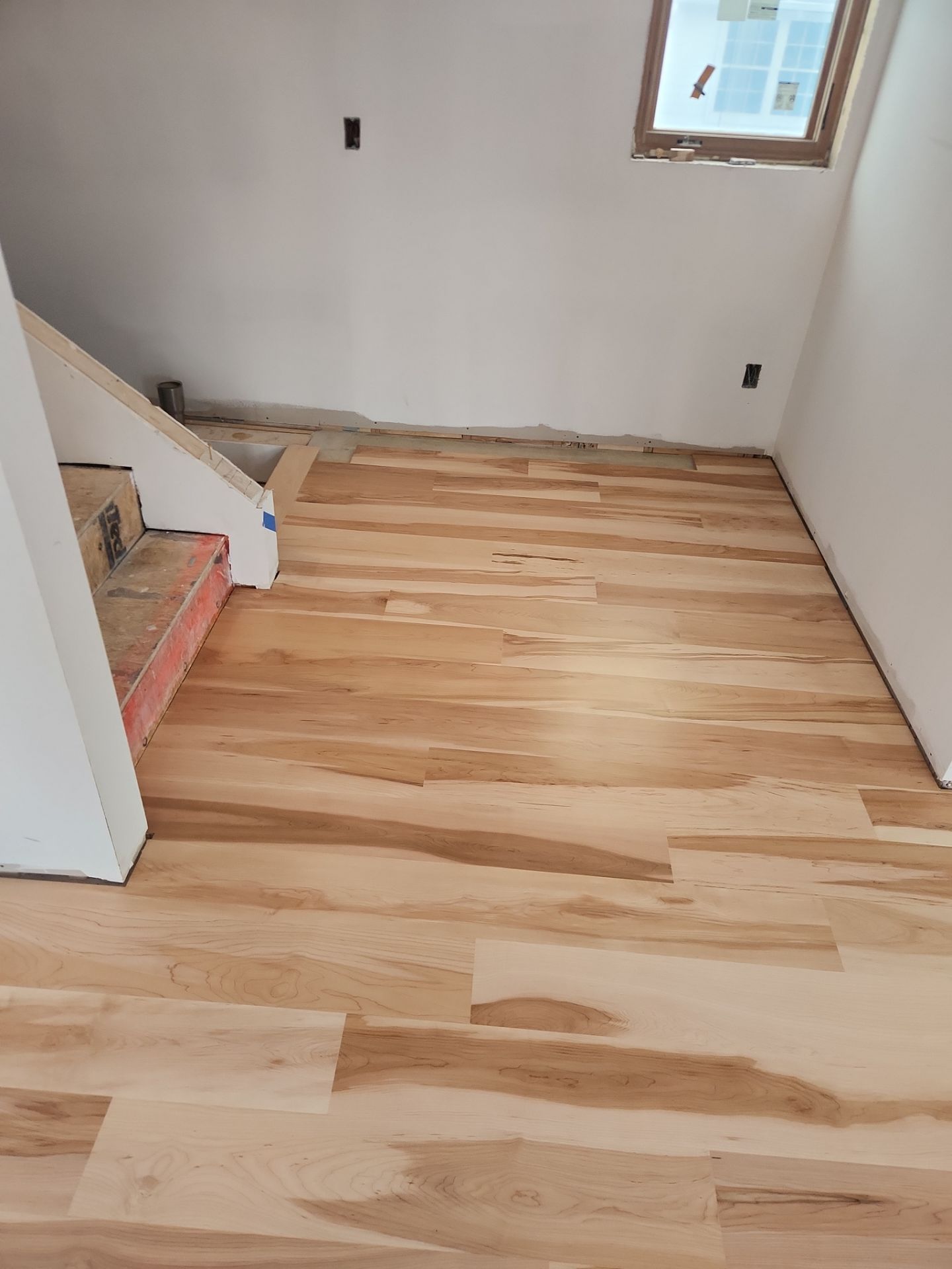 Full glue down Installation over radiant heat 7" Maple character grade by Ann Arbor Hardwoods 