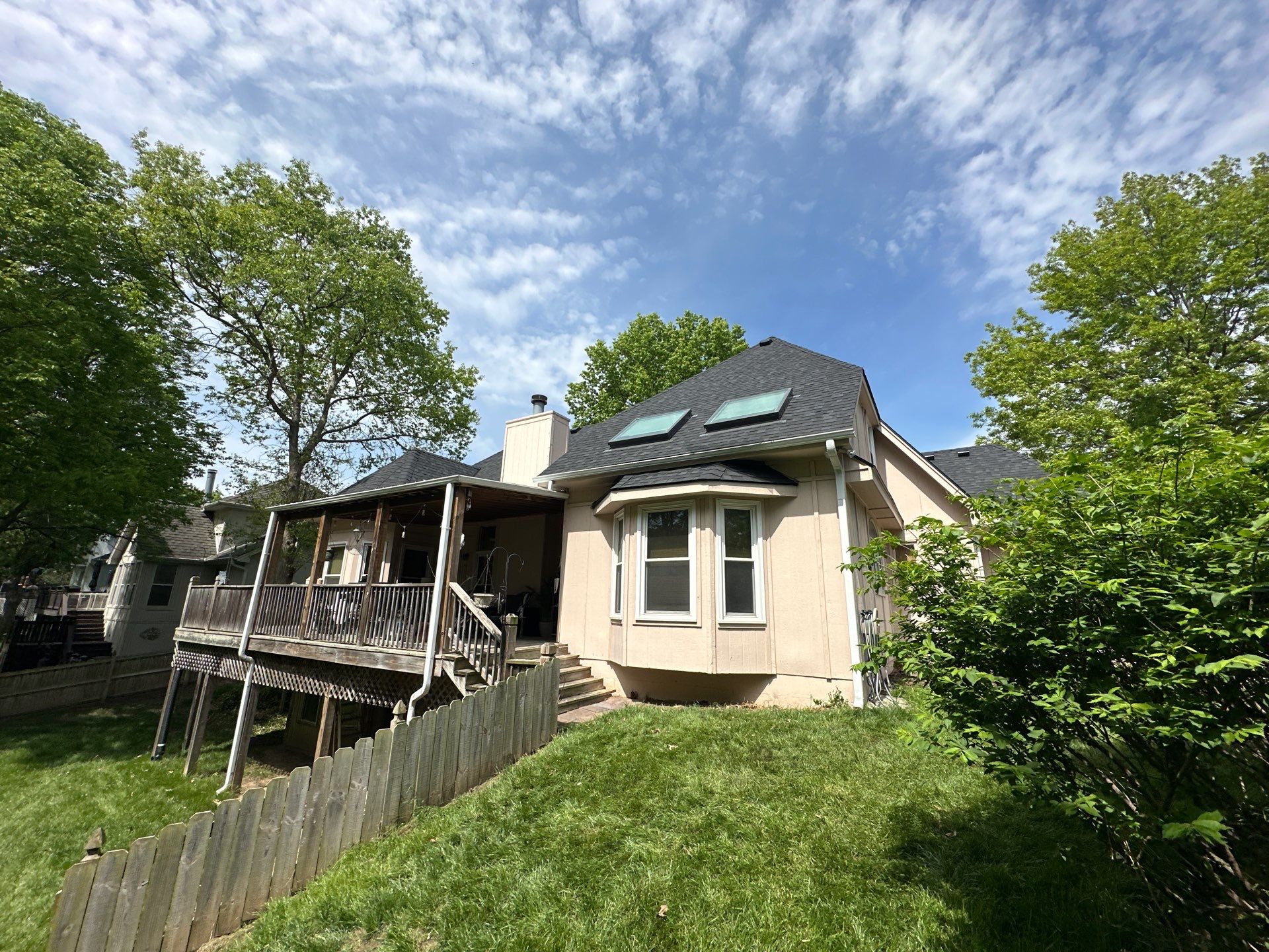 Comprehensive Roof Replacement and Skylight Installation in Kansas City by Liberty Roofing