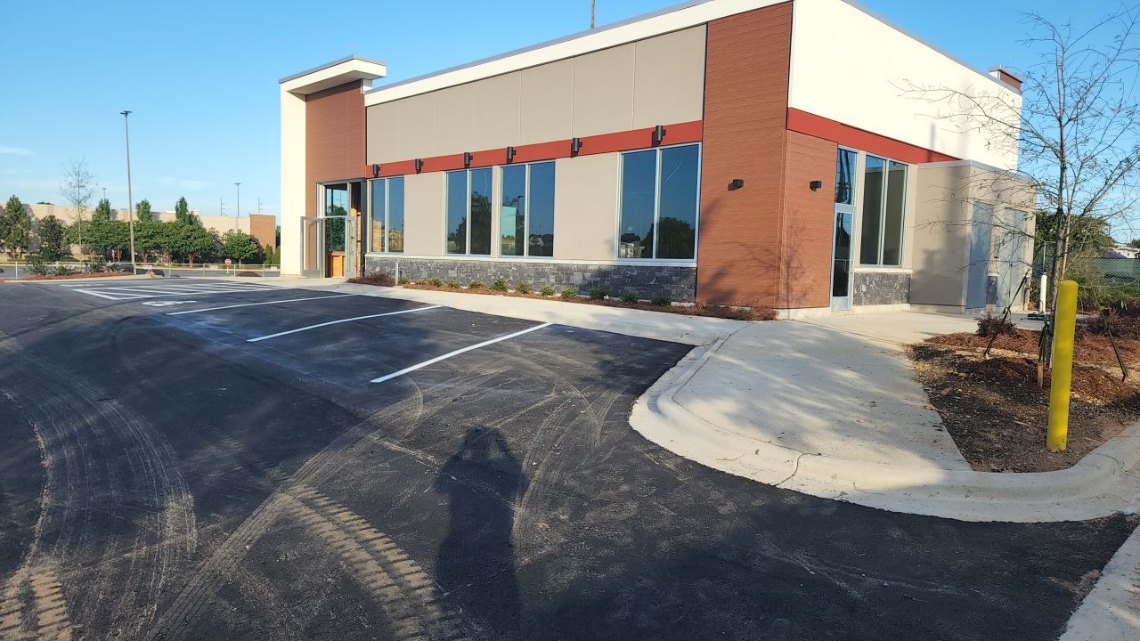 Driveway Clean using cleaner by Power Wash Masters LLC