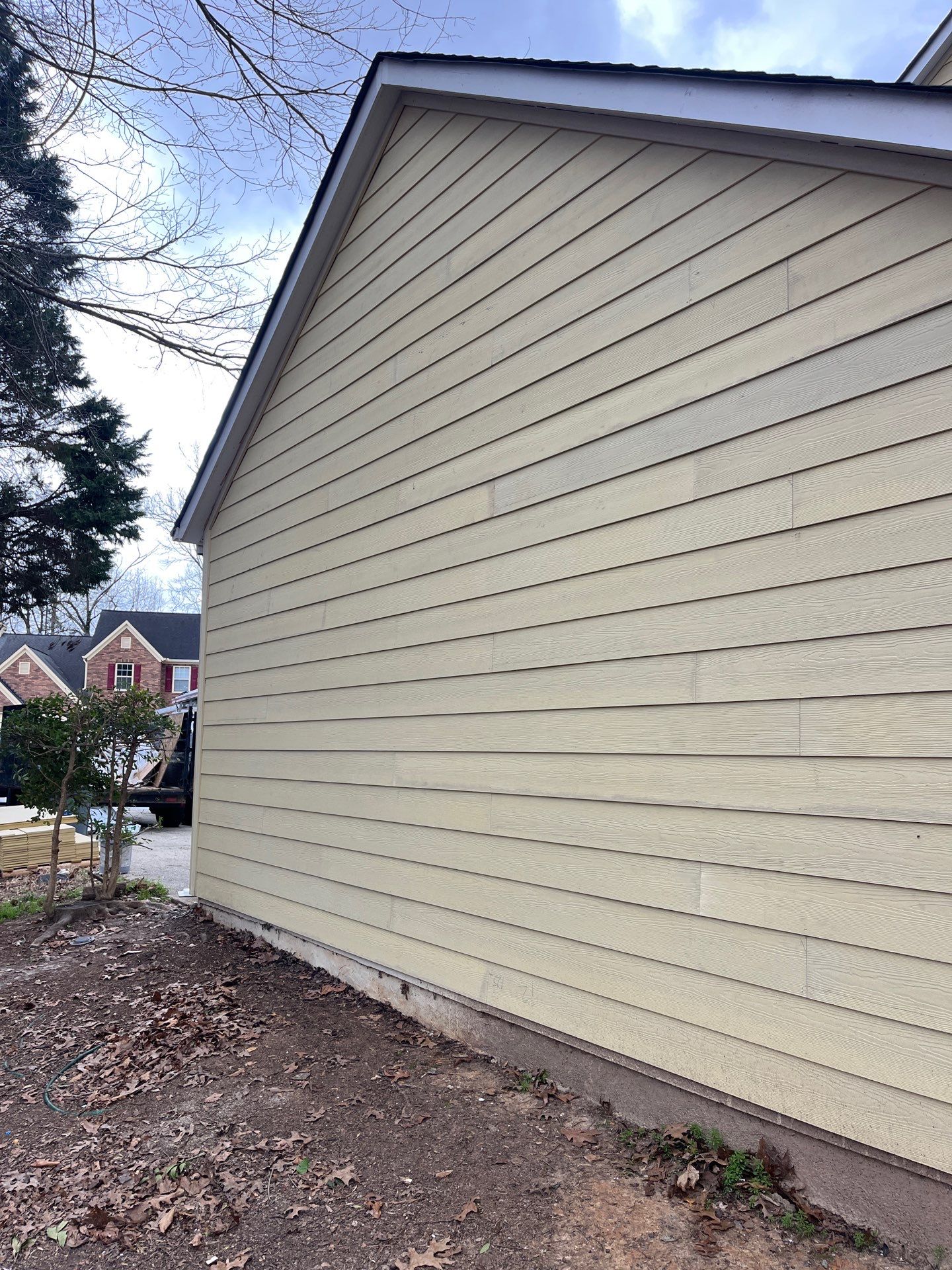 Siding and Rotten Wood Replacement, Deck Stain, and Exterior Painting in Kennesaw, GA by Nelson Exteriors