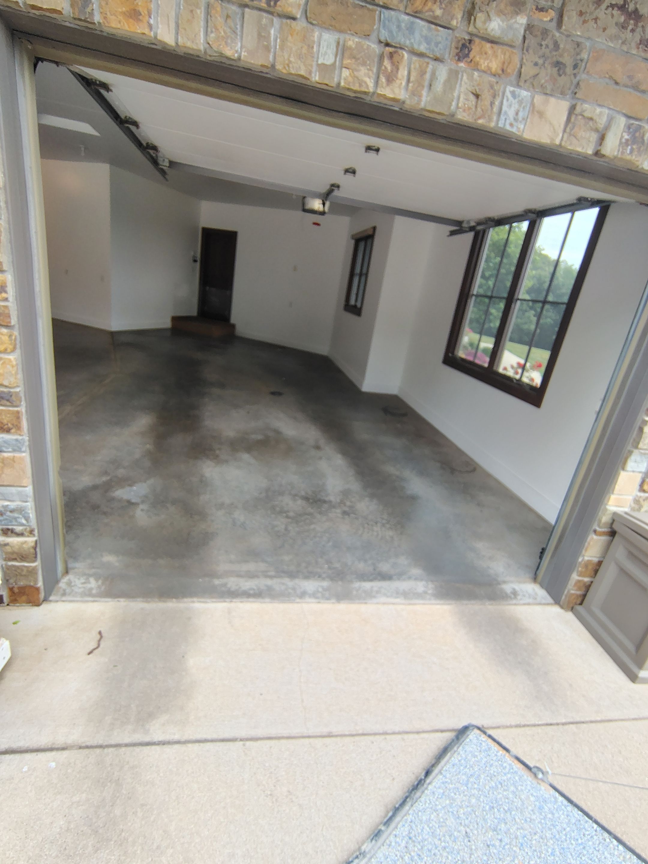 Feather Grey Floor Coating in Sioux Falls, SD by Select Painting, Coatings & Garage Cabinets