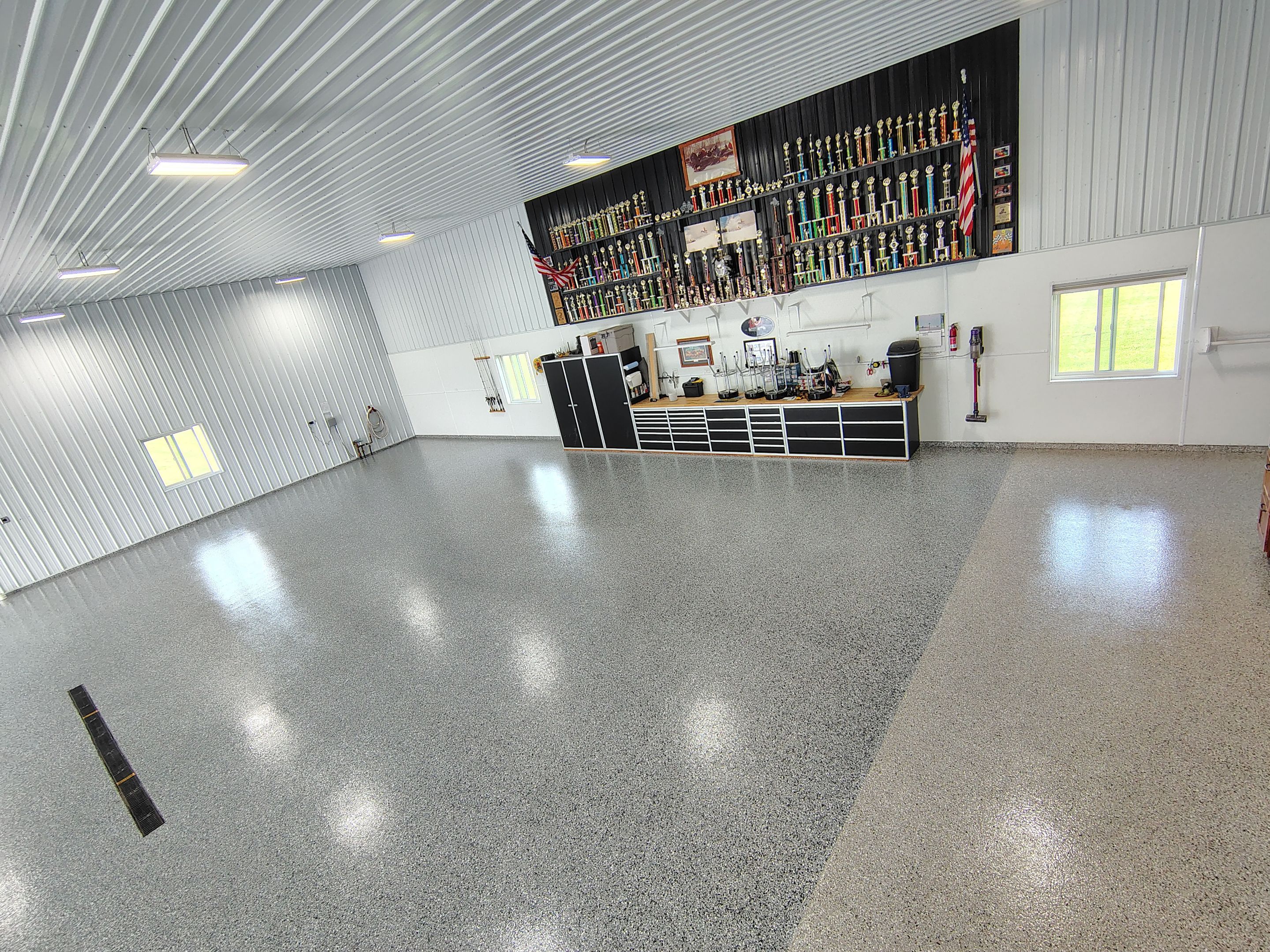 Multi-Stage Concrete Floor Coating for Egan Shop and RV Storage by Select Painting, Coatings & Garage Cabinets