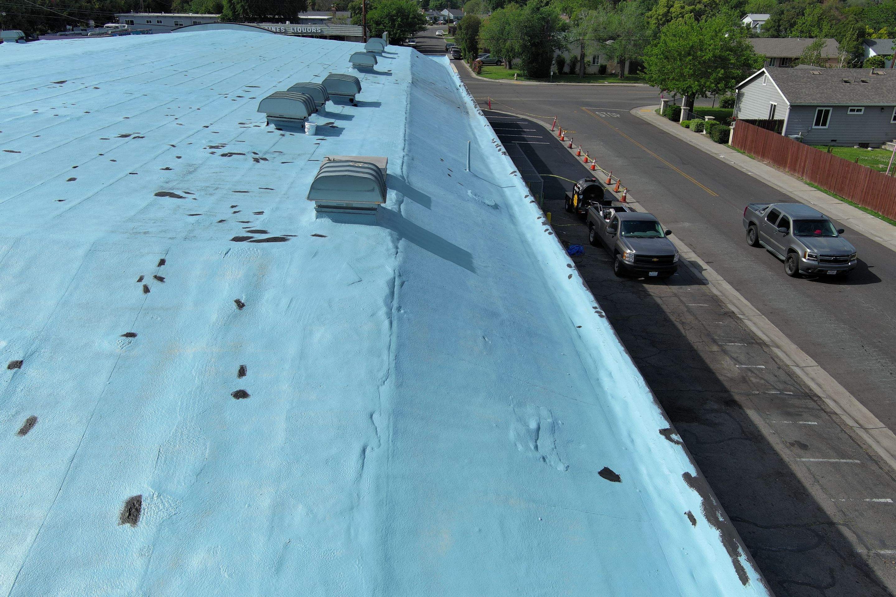 Foam Refurbish using Conklin Benchmark/PUMA XL coatings and spray foam by Straight Edge Roofing Inc