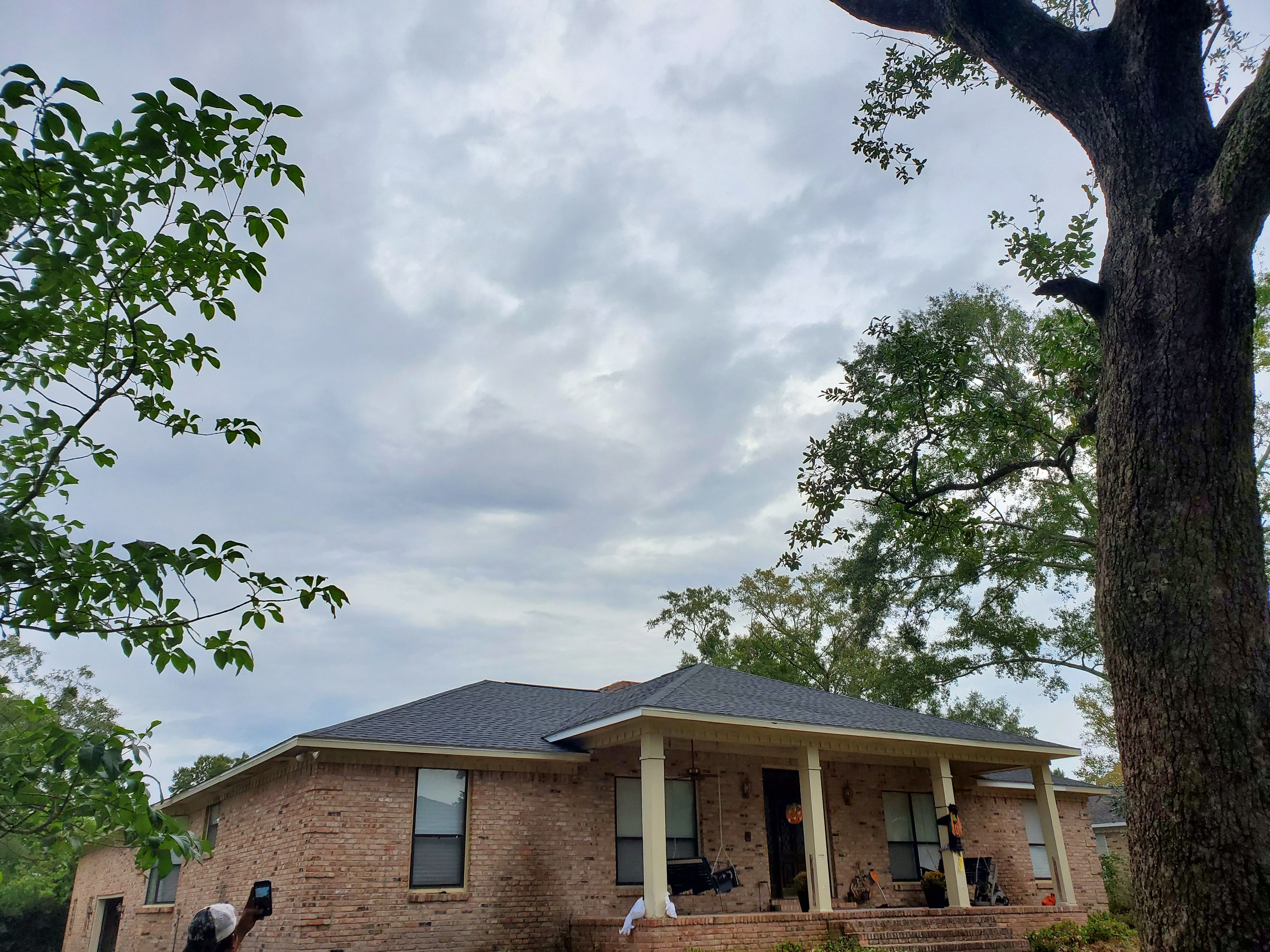 Residential Roofing Installation using Roof Replacement by American Roofing & Construction LLC
