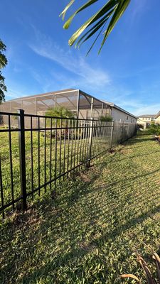 Aluminum Fence Installation using Black 3 Rail Aluminum Fence