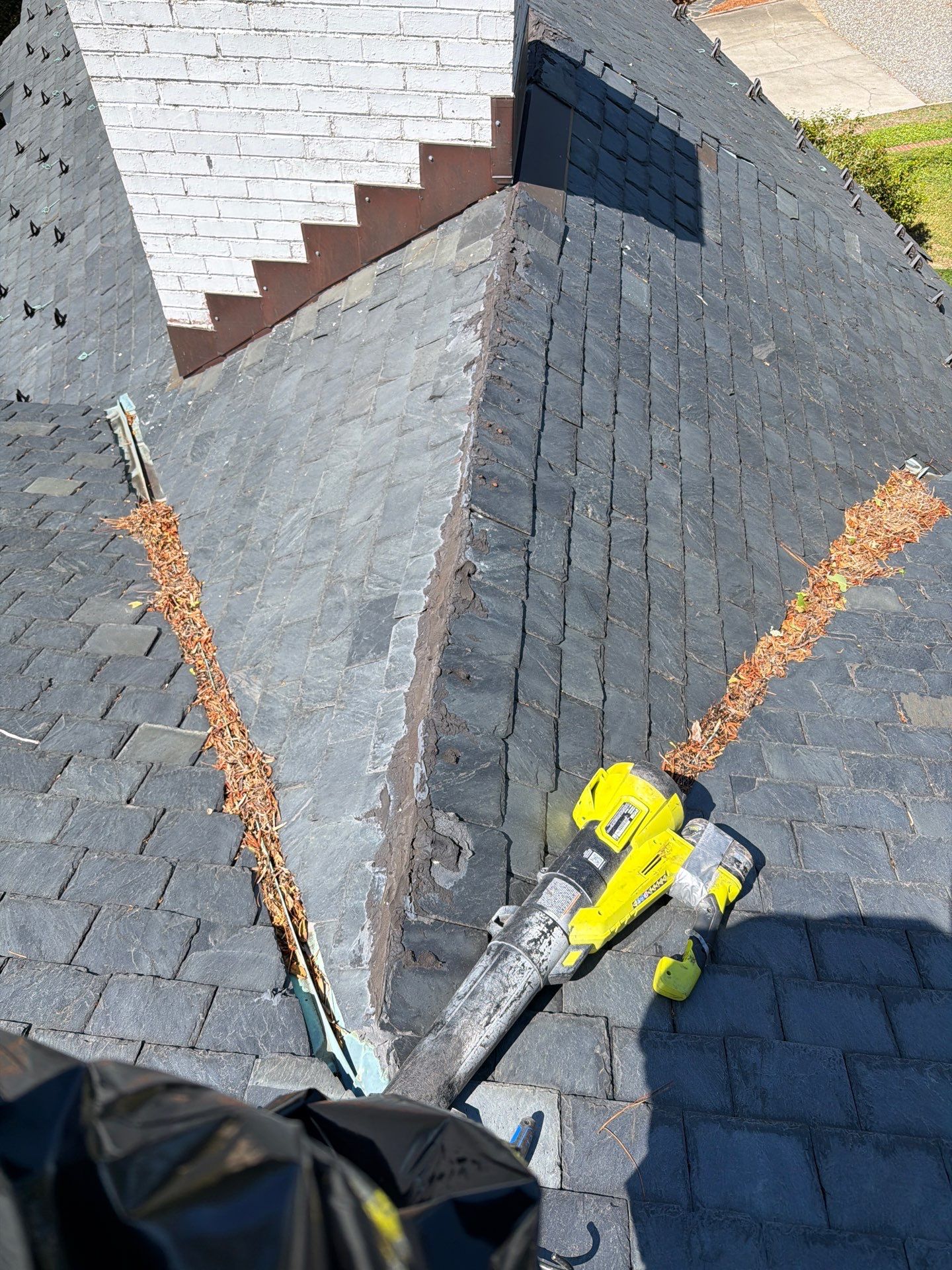 Historical Slate Roof Repair and Chimney Flashing Restoration in West Point by Cade Construction