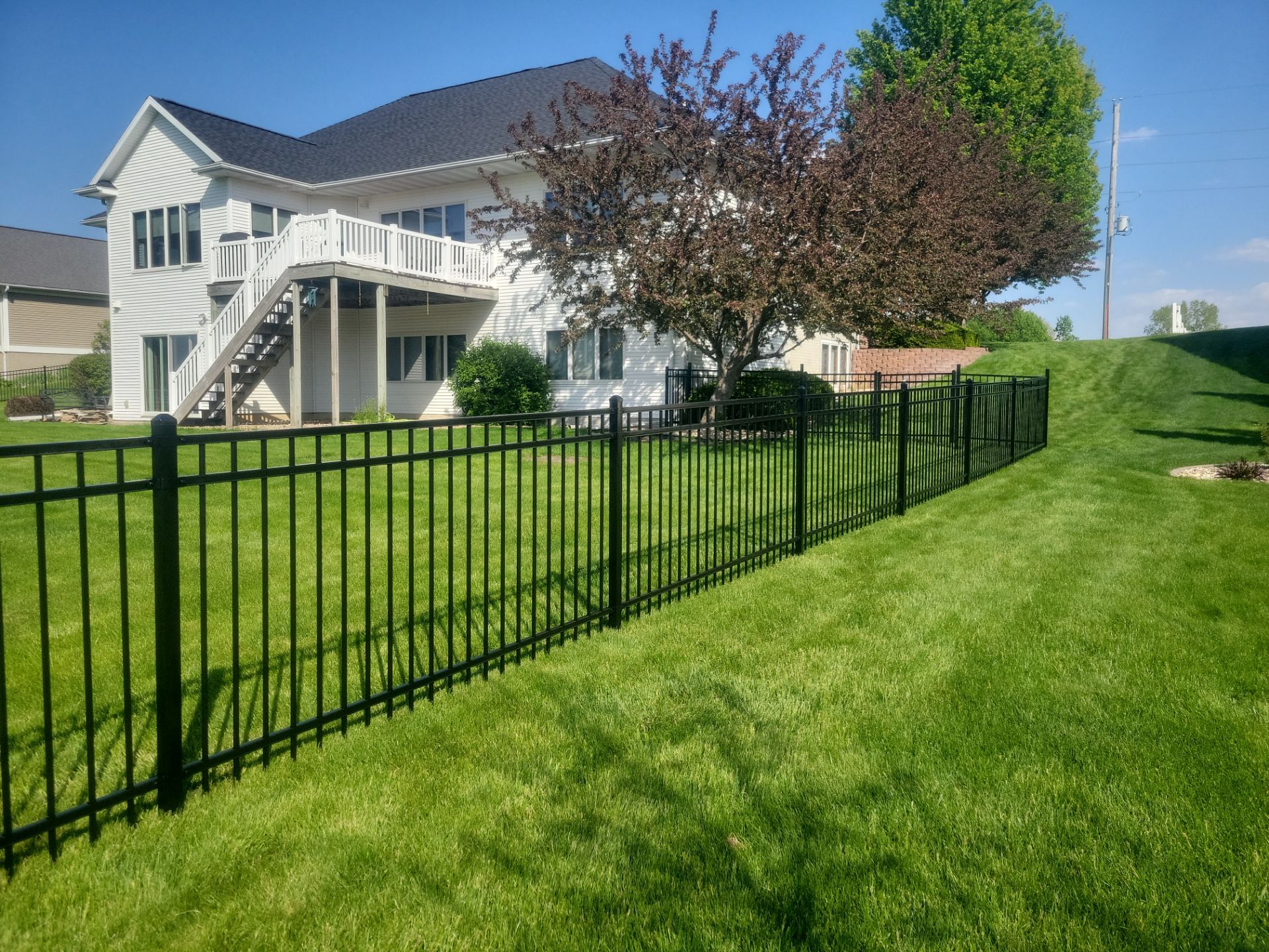 Black Ornamental Metal Picket Fence Installation in Waterloo by Perfect Picket Fence and Stain
