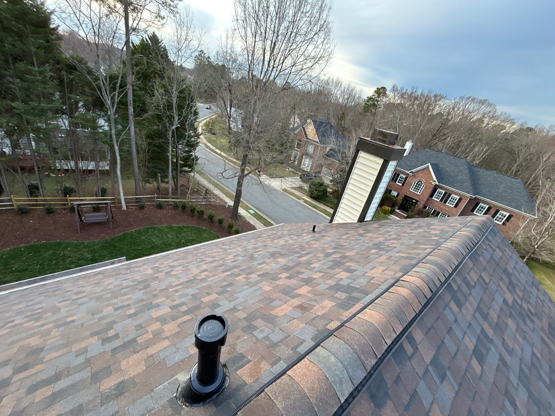 Owens Corning Duration Shingle Roof Replacement and Velux Skylight Installation in Charlotte by Merritt Roofing LLC