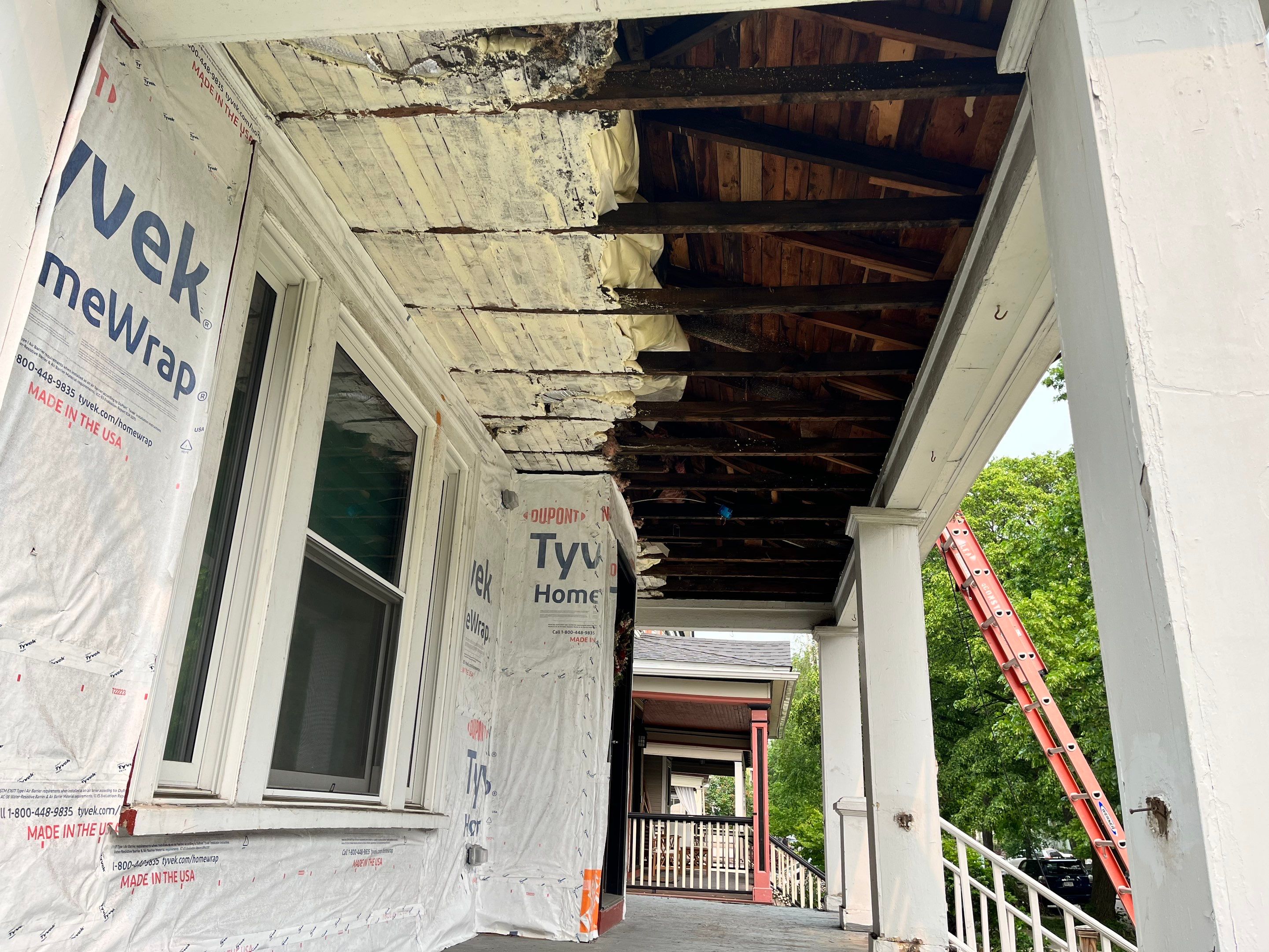 Exterior Renovations- Siding, Stamped Concrete, Porch, and Railings by Ivy Lea Construction