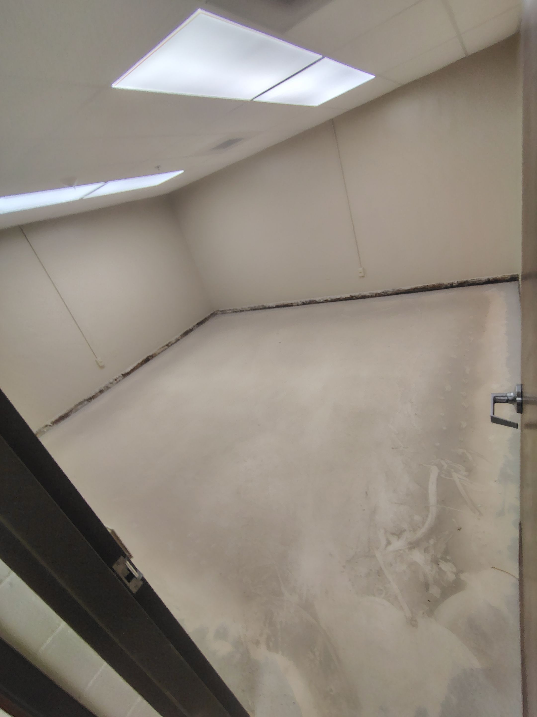 Industrial Flake Epoxy Floor Installation at Pierre National Guard Facility by Select Painting, Coatings & Garage Cabinets