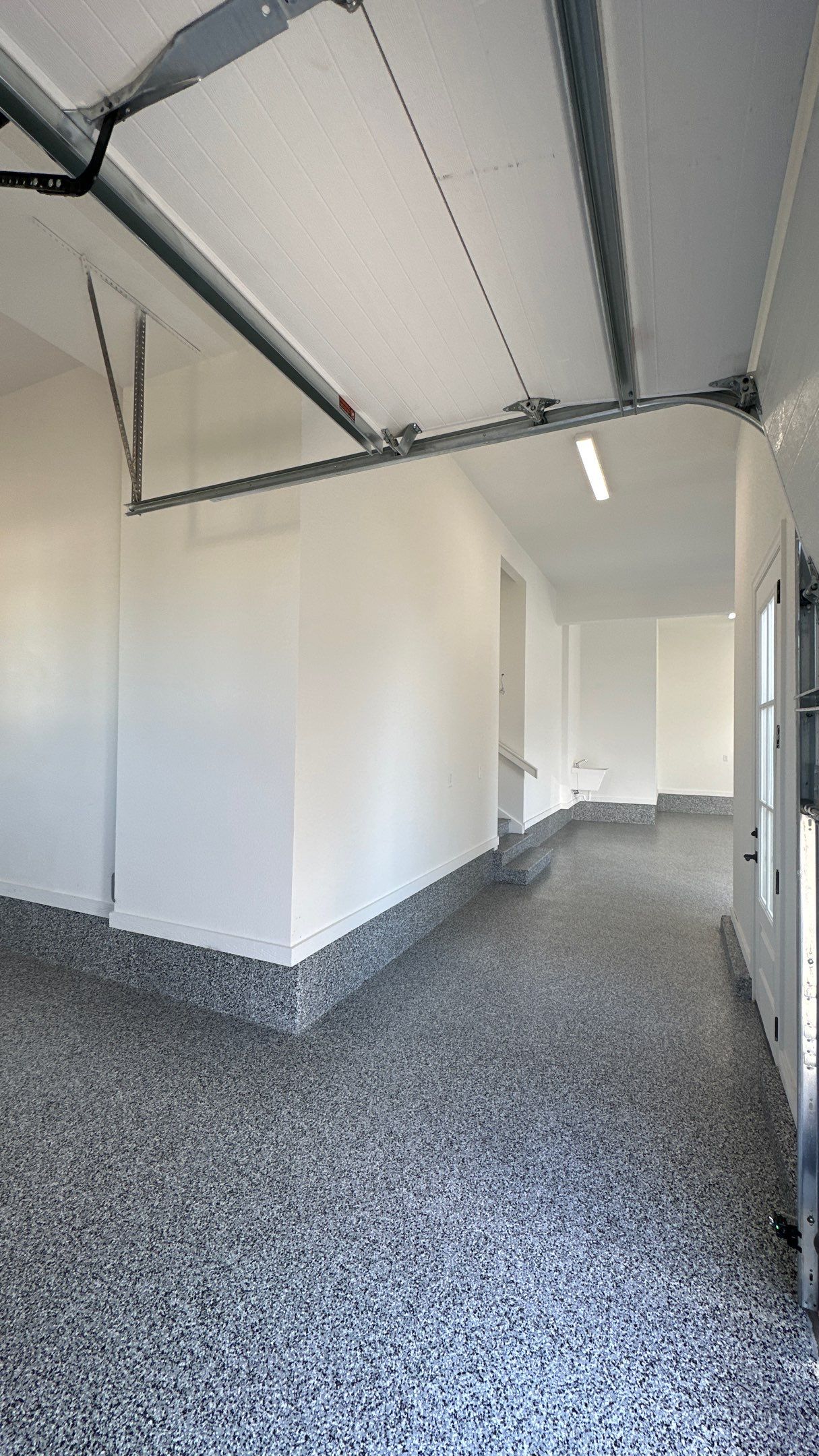 Mike & Pam transformed their garage with a Banner Garage Floor and Cabinets by Banner Garage