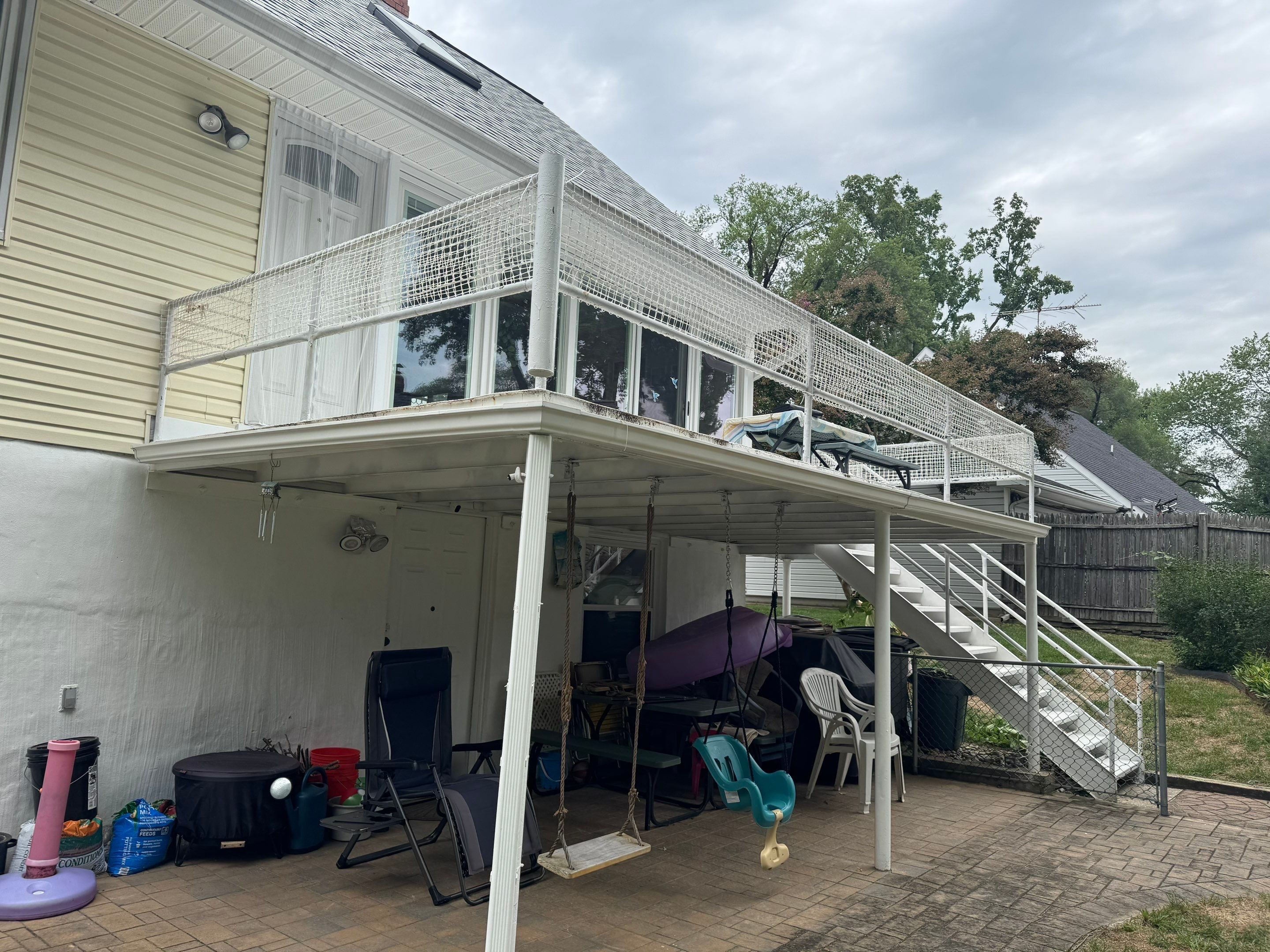 White Powder-Coated Outdoor Railings in Rockville & Staircase and Deck Refurbishment  by Capitol Iron Works
