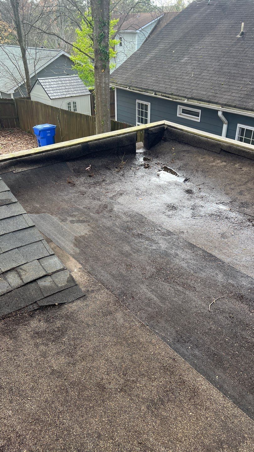 Gutter Cleaning using brown bags by Roof Bullies
