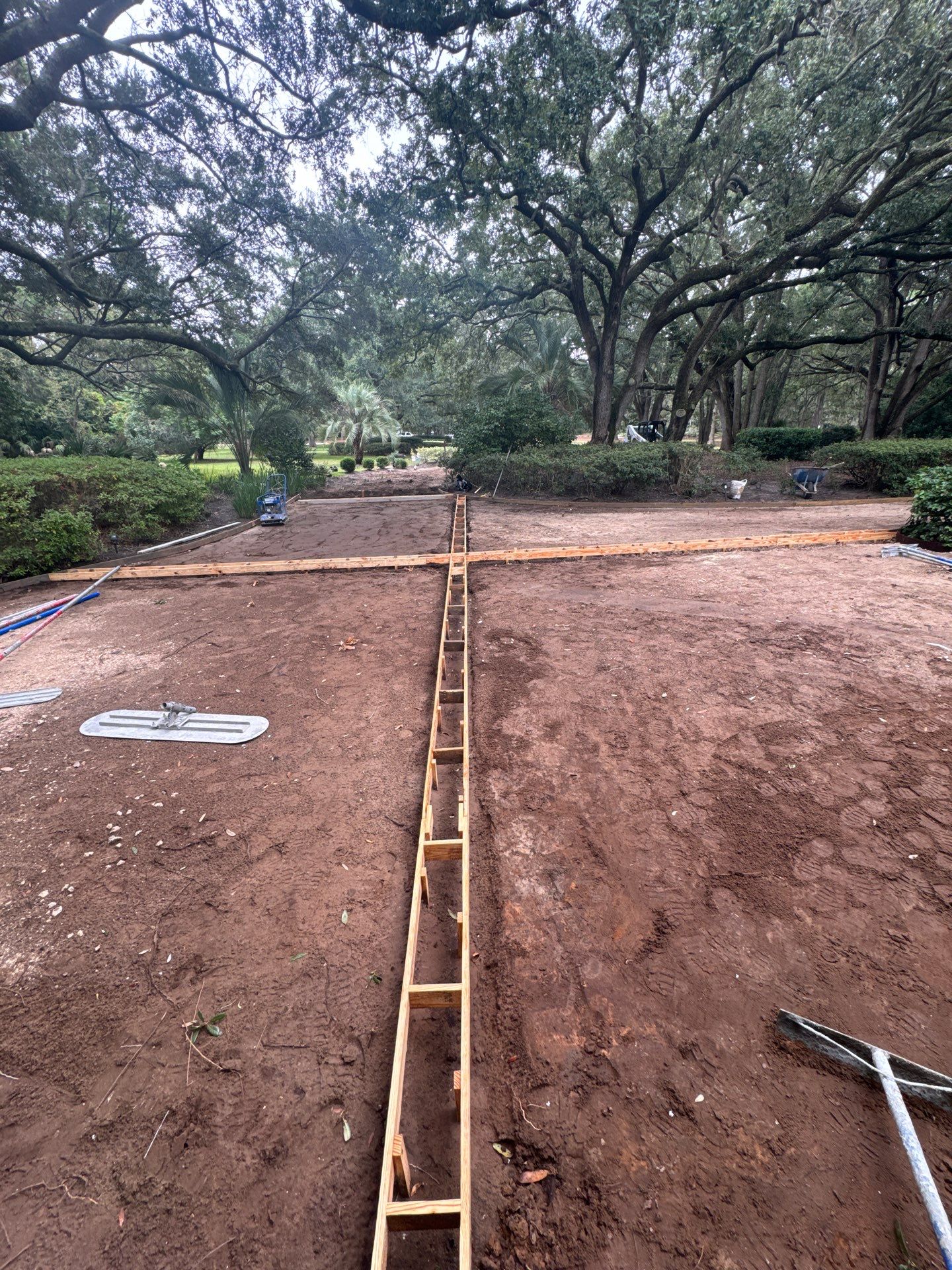 Custom Concrete Driveway with Decorative Paver Inlays in Hilton Head Island by Lowcountry Scapes, LLC