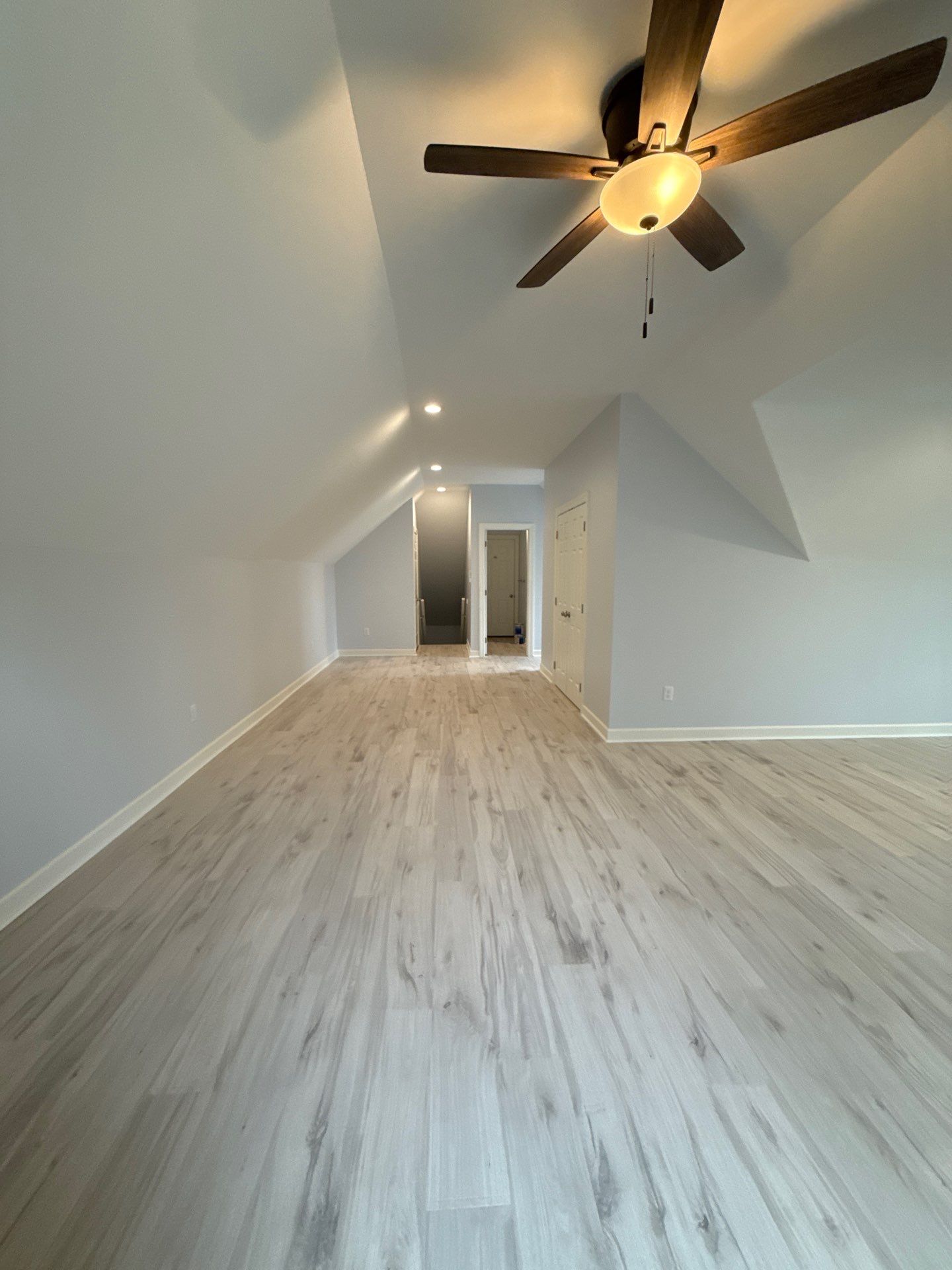 Attic Conversion by Skilled Construction LLC