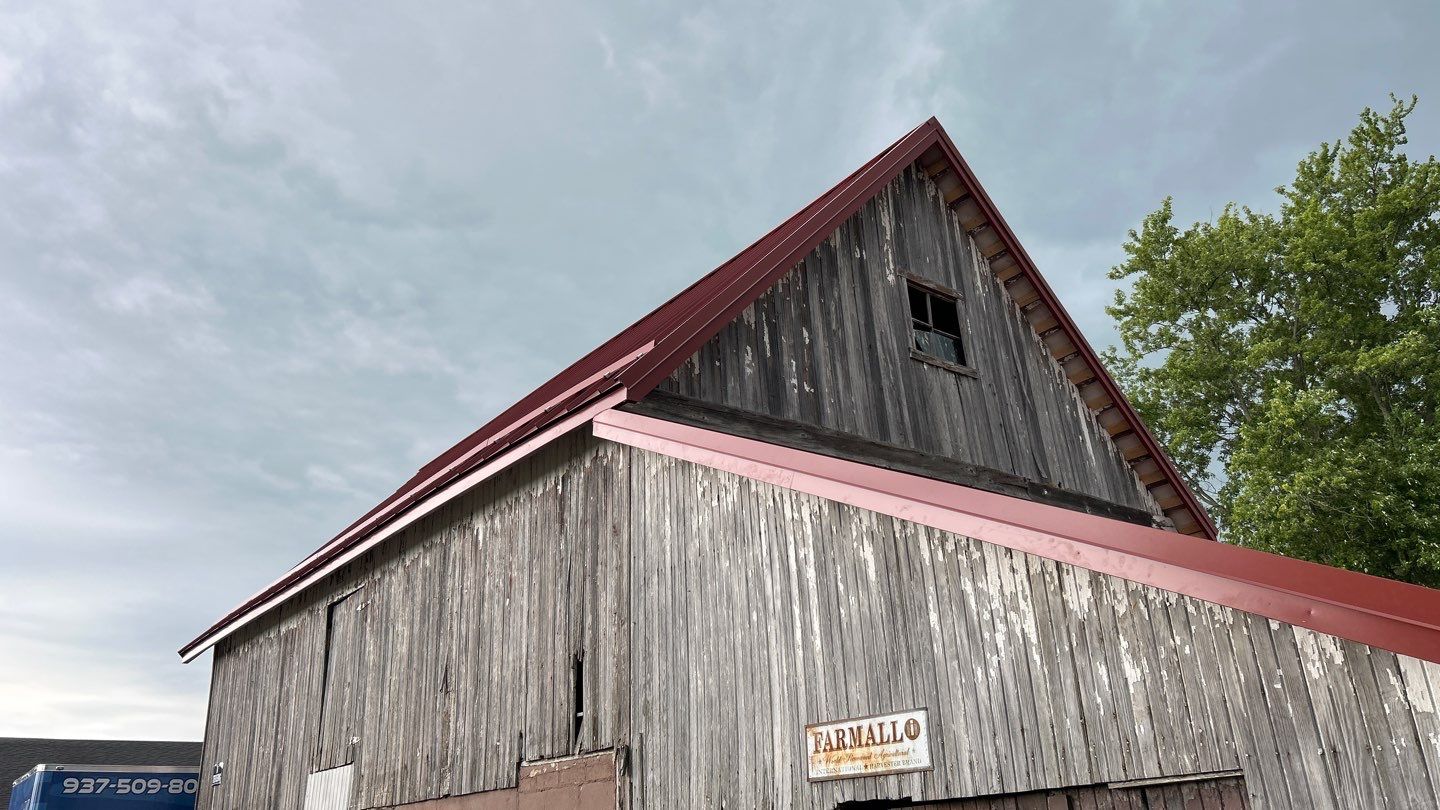 Residential Roofing Installation using Standing Seam Metal - Barn Red by RoofX 