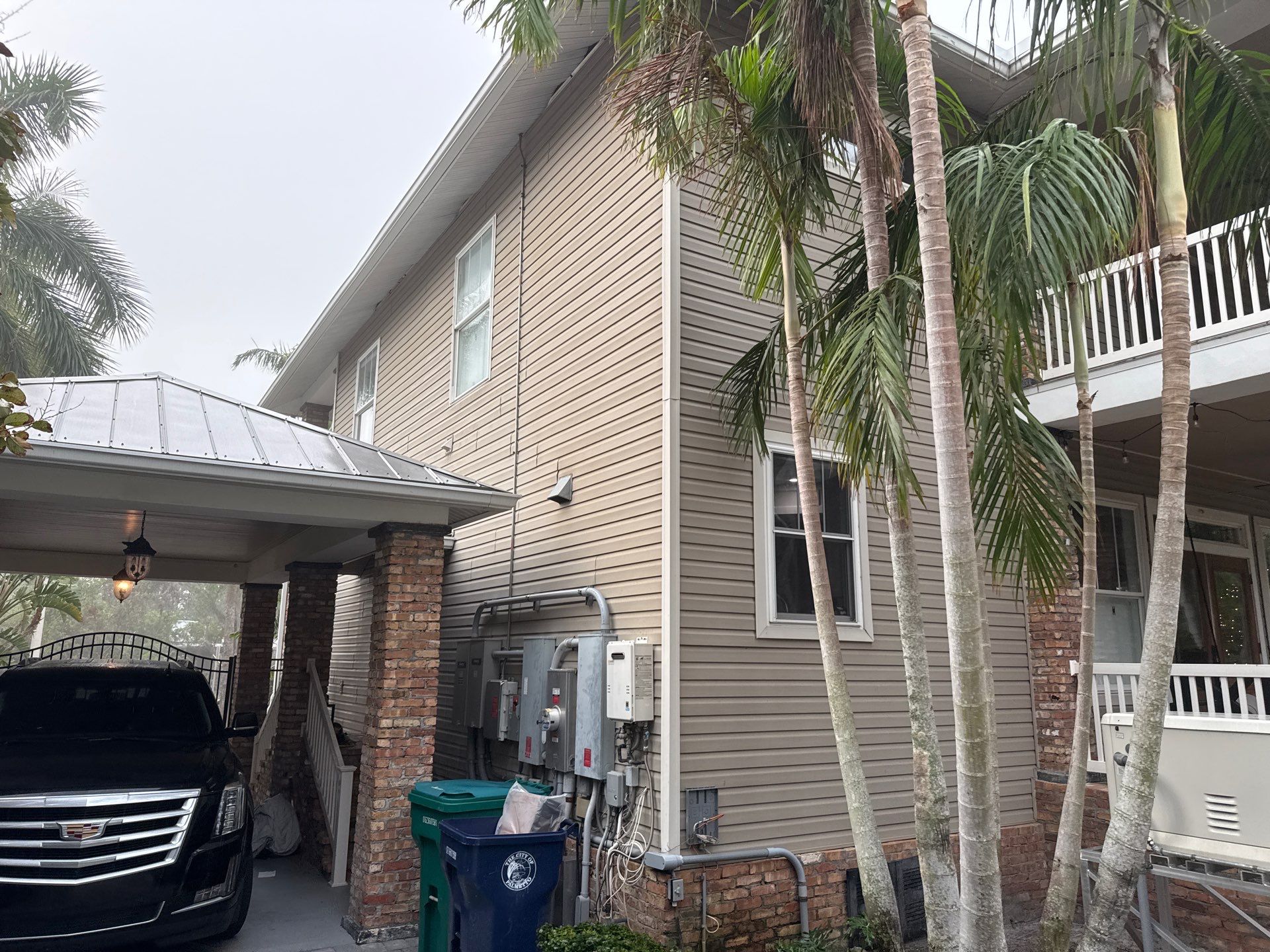 2-Story House Wash and Garage Pressure Washing in Palmetto, FL by Sunshine AquaWash