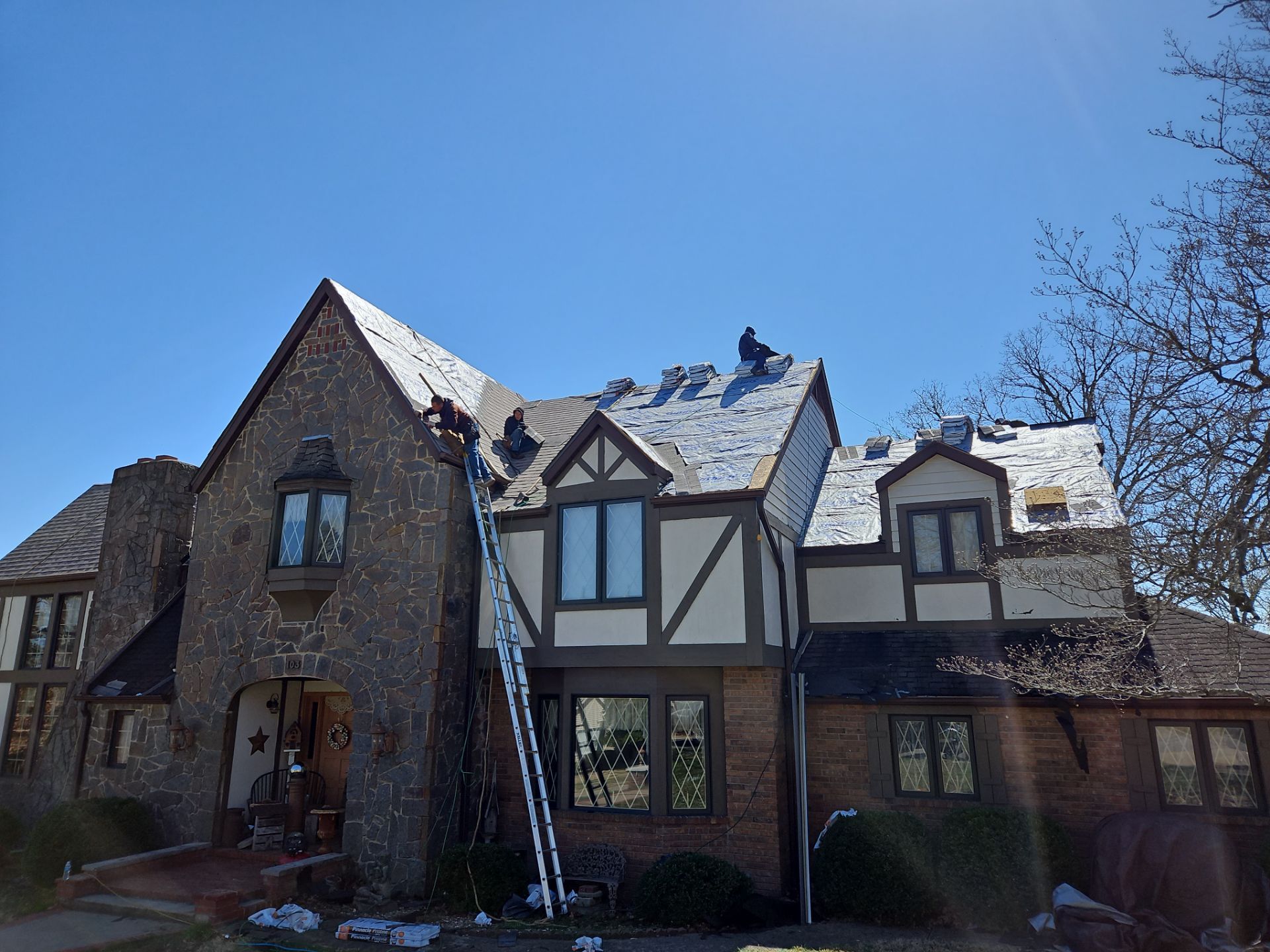 Residential Roof + Gutters & Downspouts & Gutter Guards Install  by Titan Commercial & Residential Roofing 