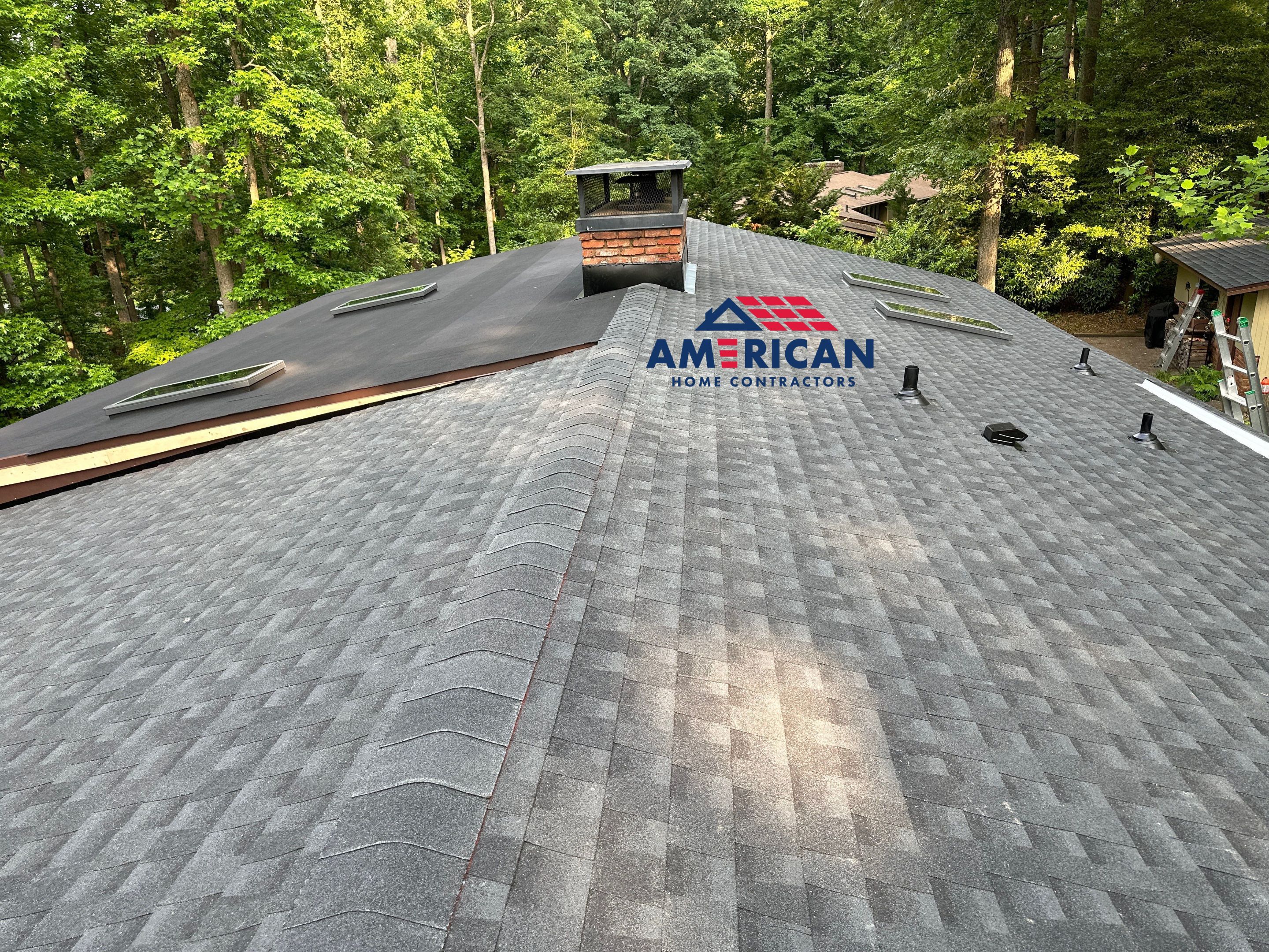 Acorn Deck House Roof Replacement + Skylight Addition by American Home Contractors