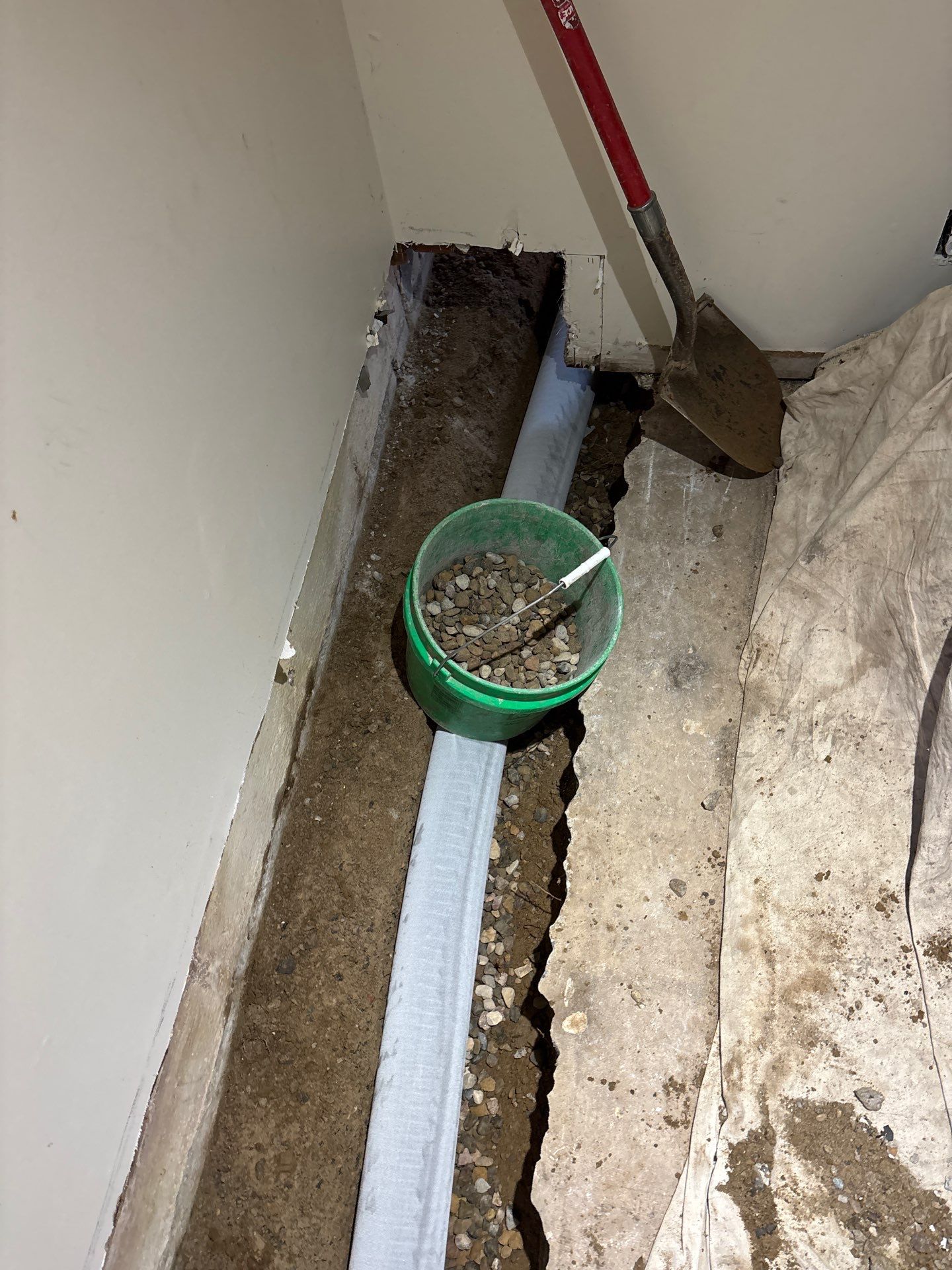 Completing the Connection for Lisa's Drain Tile System by Waterproofing Northeast