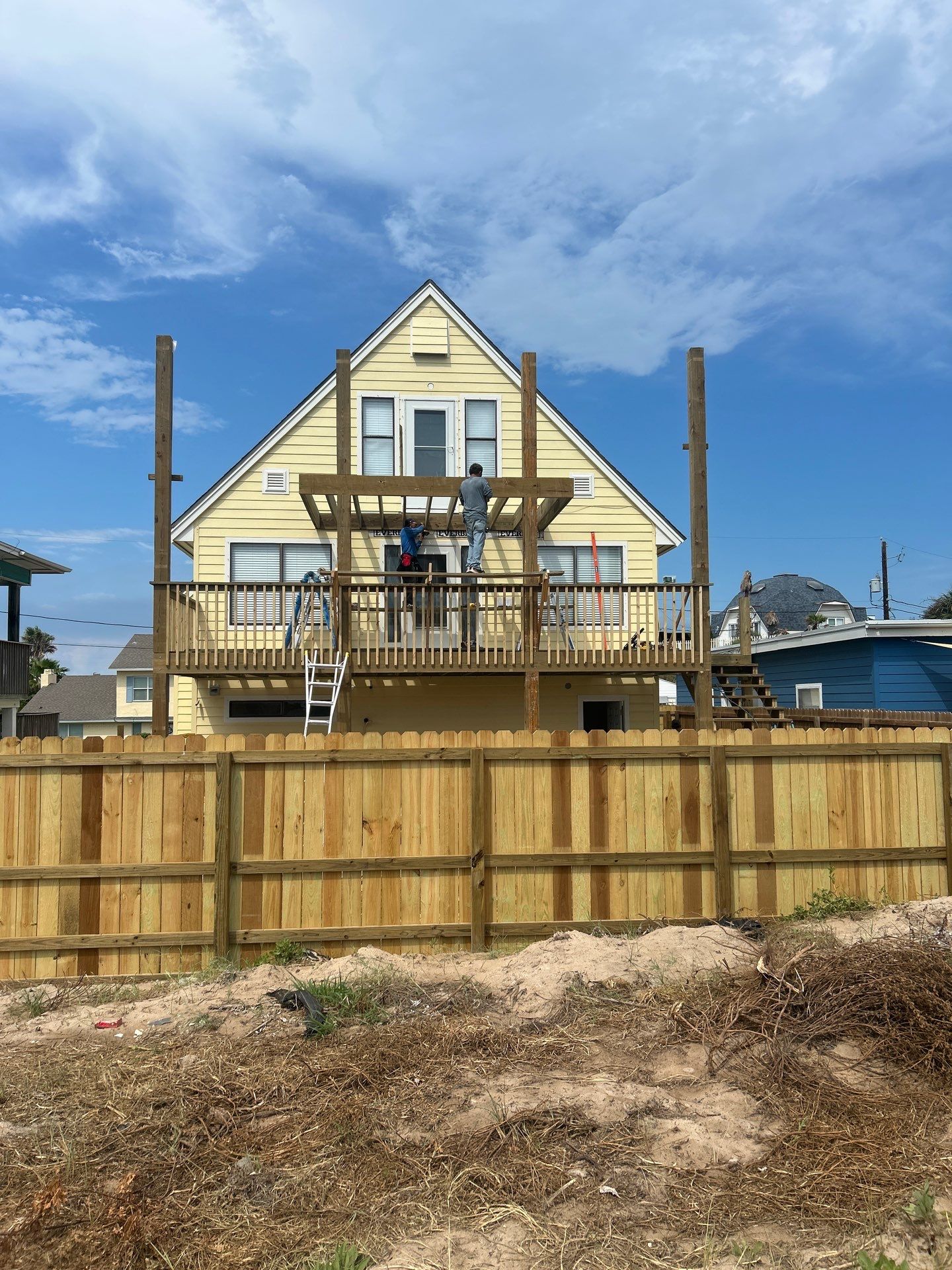 Walk Out Patio Cover by Bayfront Roofing and Construction