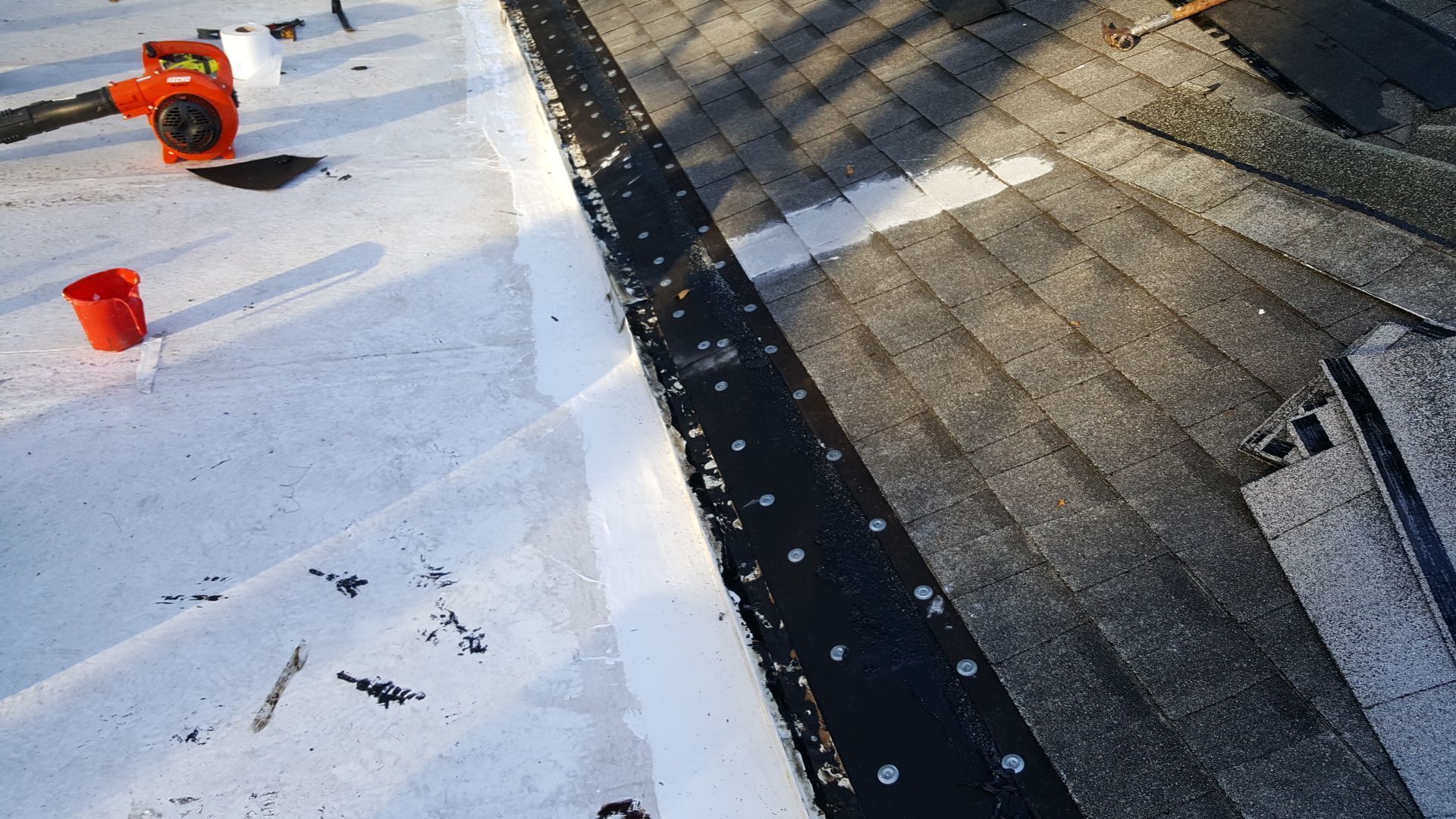 Flat Roof Repair using Certainteed Flintlastic SA Roofing System by Aastro Roofing