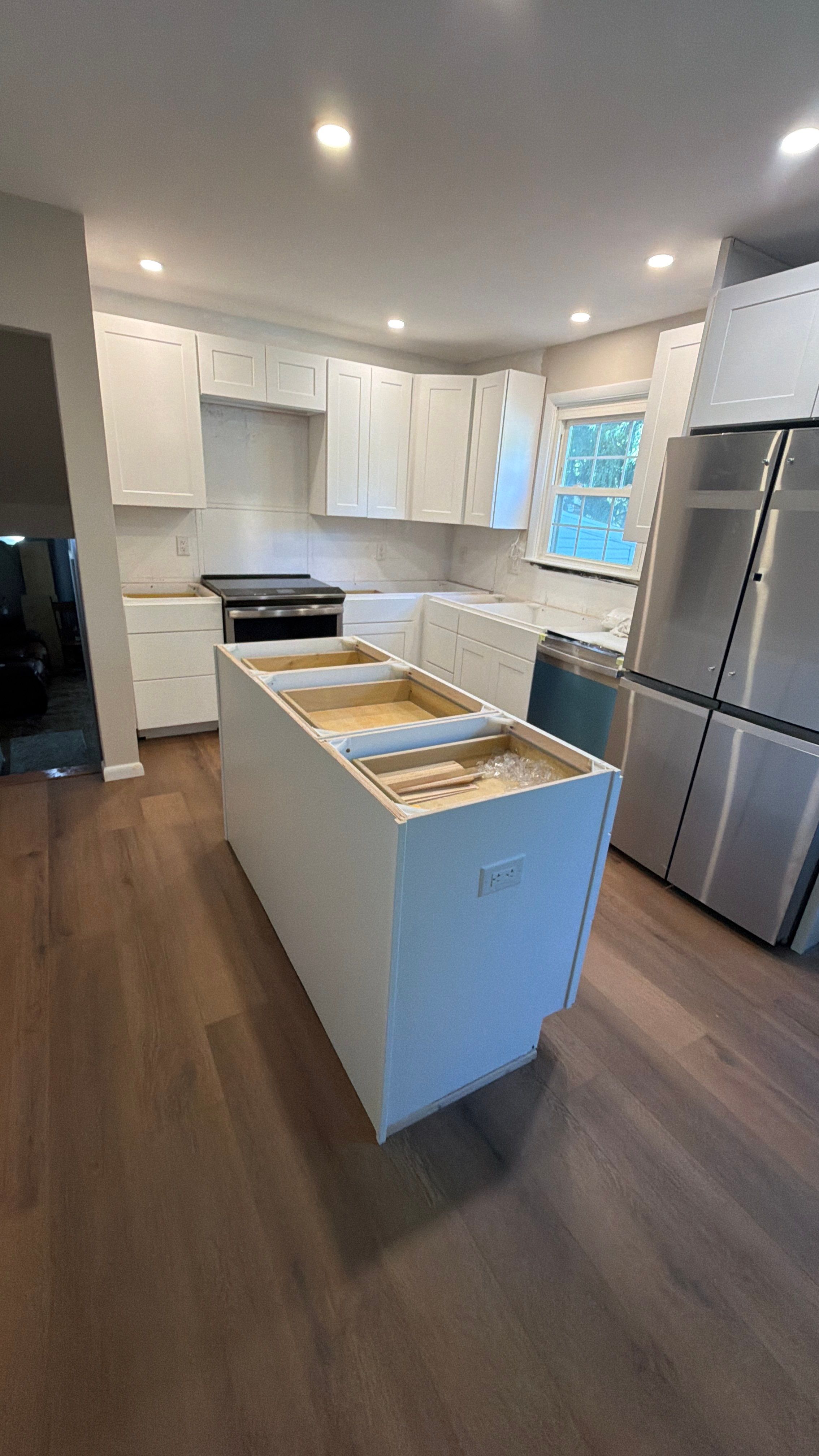 Phoenixville Kitchen Remodel with White Shaker Cabinets and Green Backsplash by Reliable General Contracting
