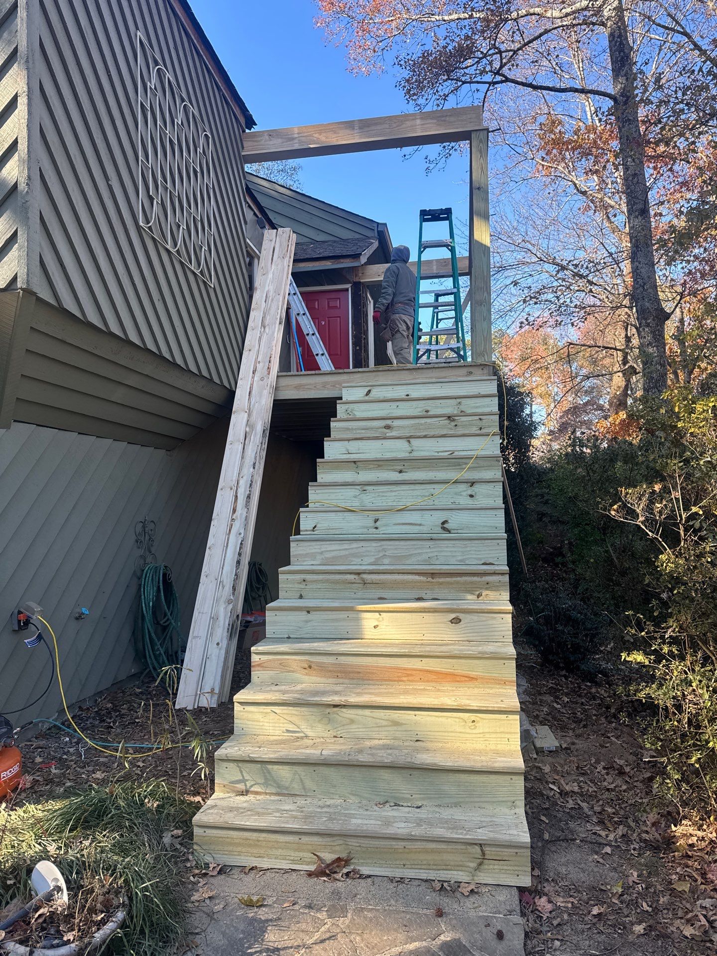 Elevated Wood Deck and Siding Replacement in Marietta by Swift Home Renovations