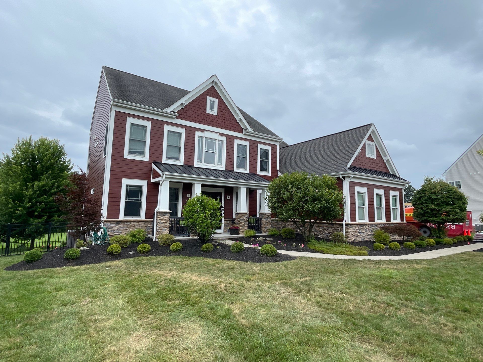 Countrylane Red James Hardie Siding Replacement in Franklin Park by Knockout Home Solutions