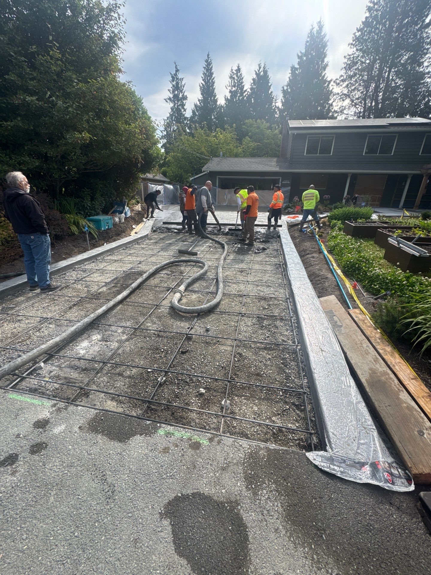 Concrete Driveway Makeover | Edmonds  by Jireh Asphalt & Concrete Inc 
