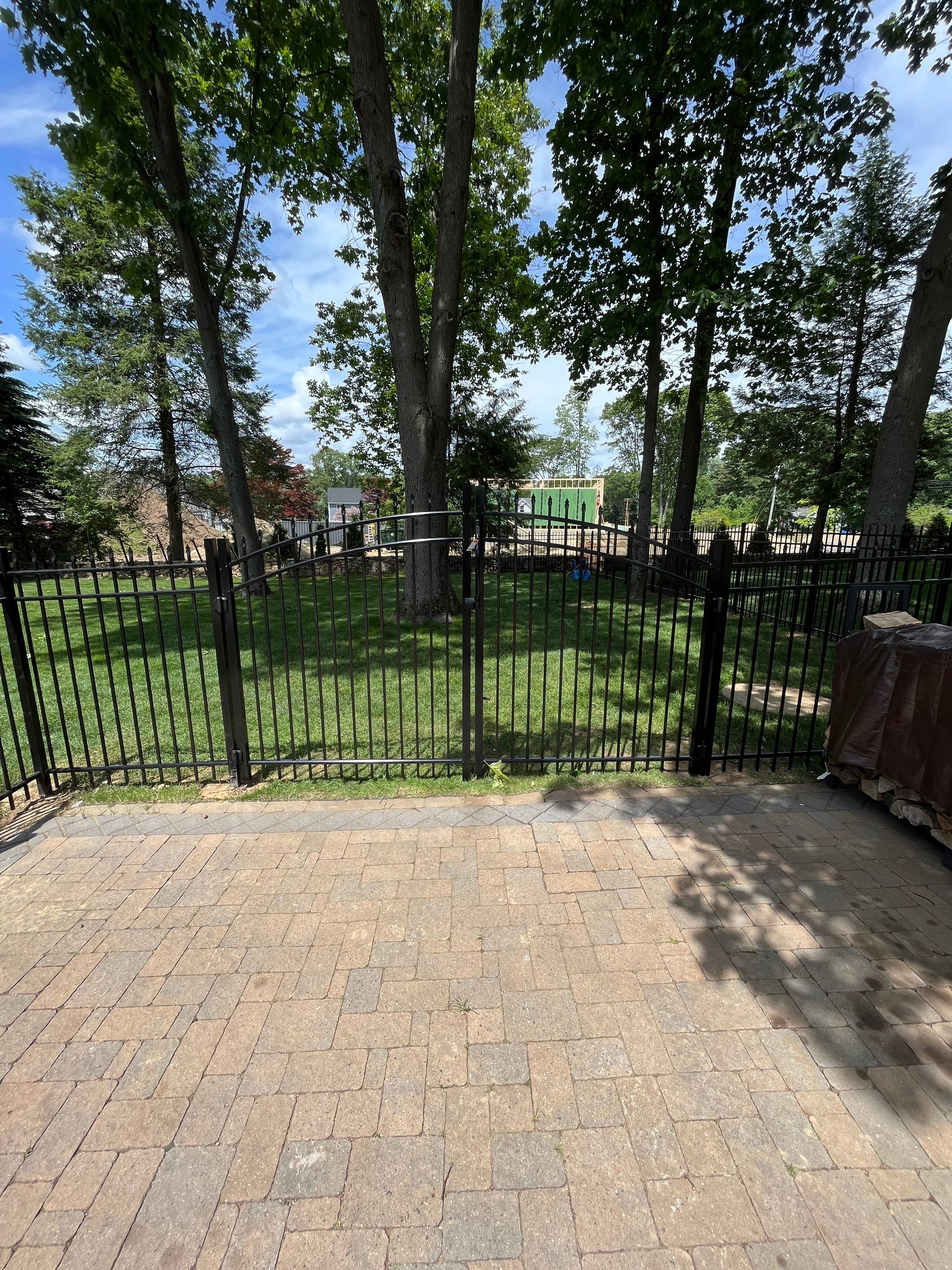 New Black Aluminum fence with matching gate by DiGiorgi Roofing and Siding Inc