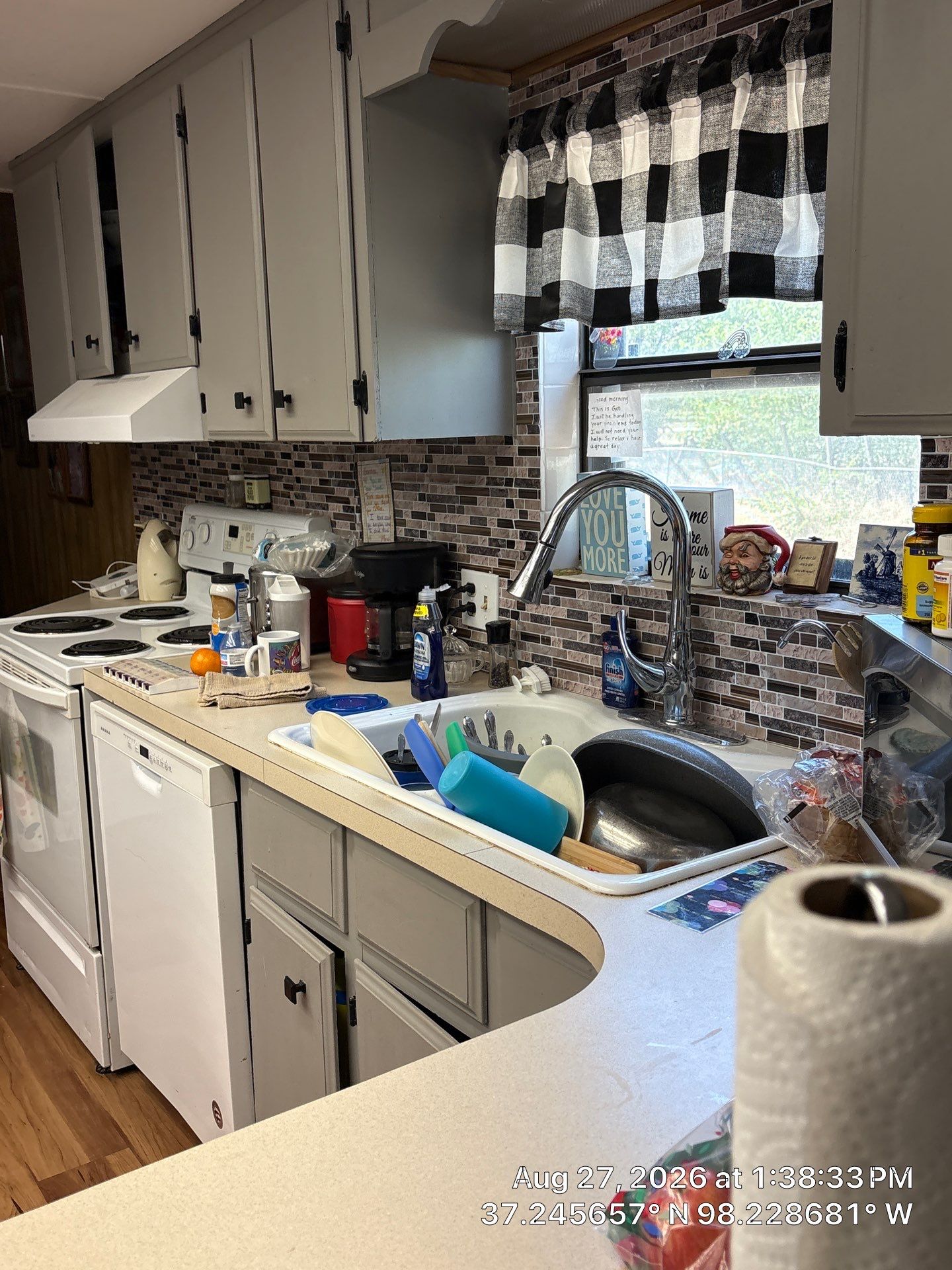 Attica Kitchen Remodel With Grey Cabinets and Mosaic Backsplash by CompanyCam Sales Demo