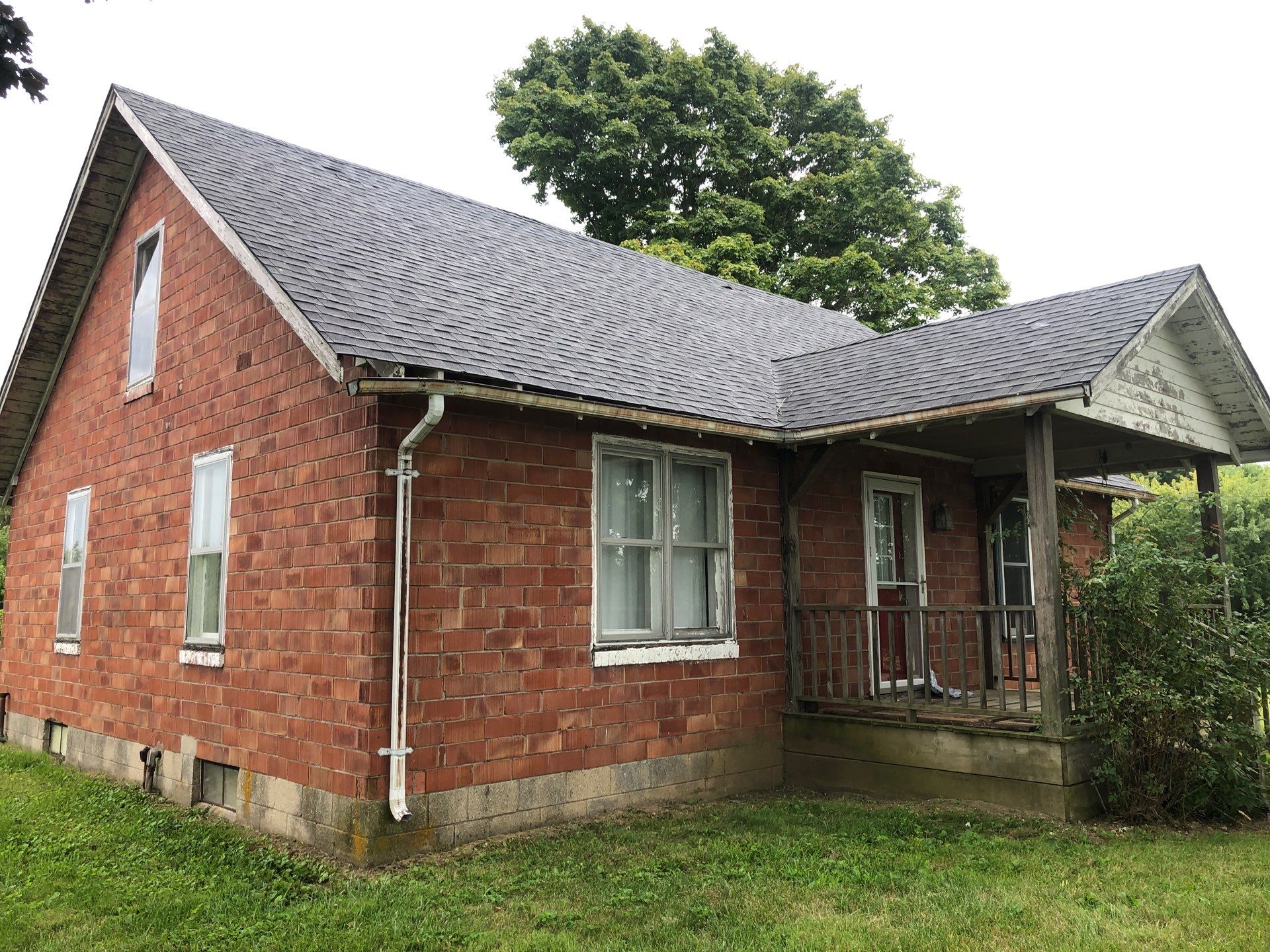 Old Farmhouse Restoration by 317 Roofing & Restorations