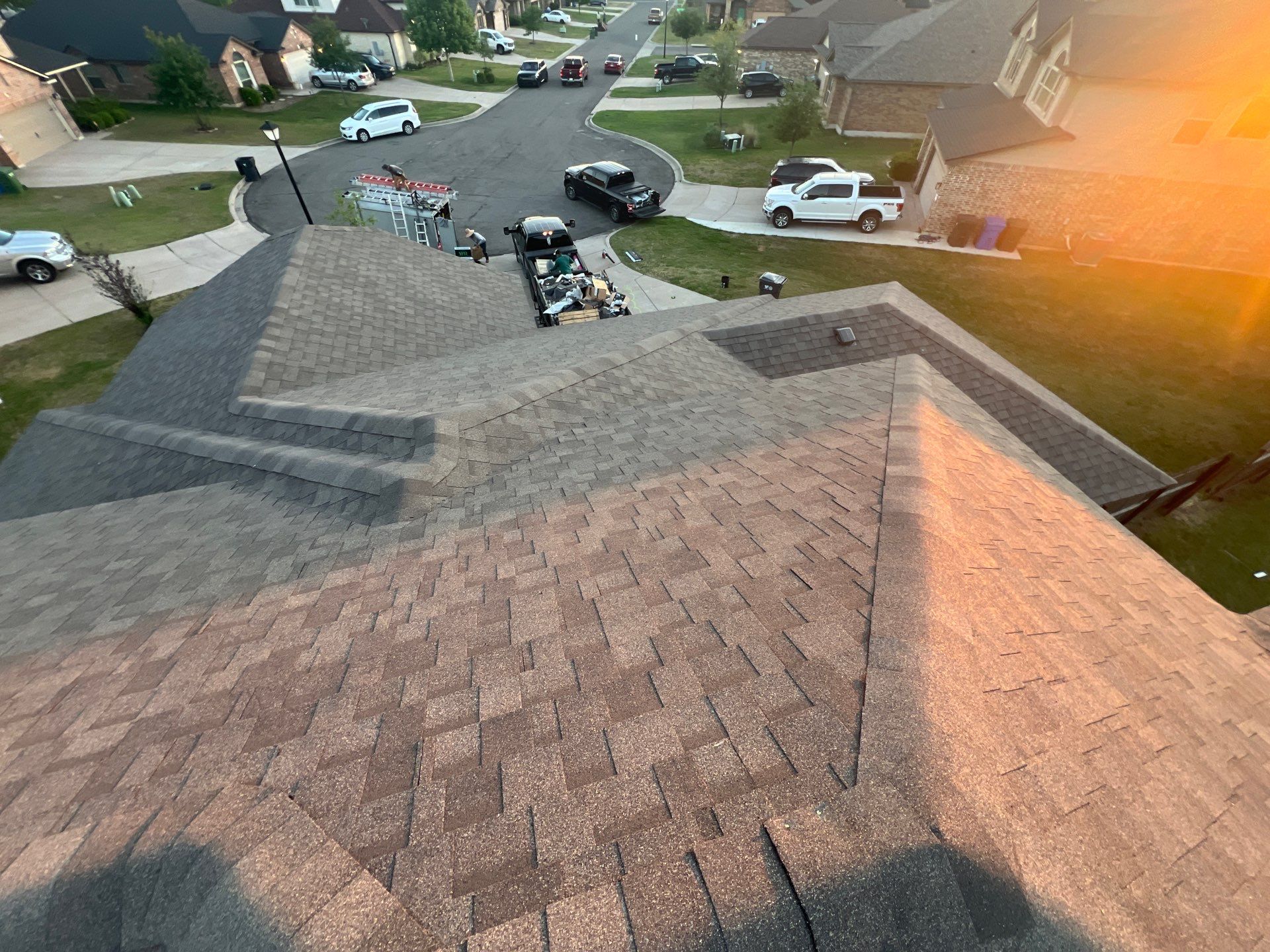 Residential Roofing Installation using IKO Cambridge 30yr Architectural Shingles. Color: Weatherwood by WR Roofing Solutions