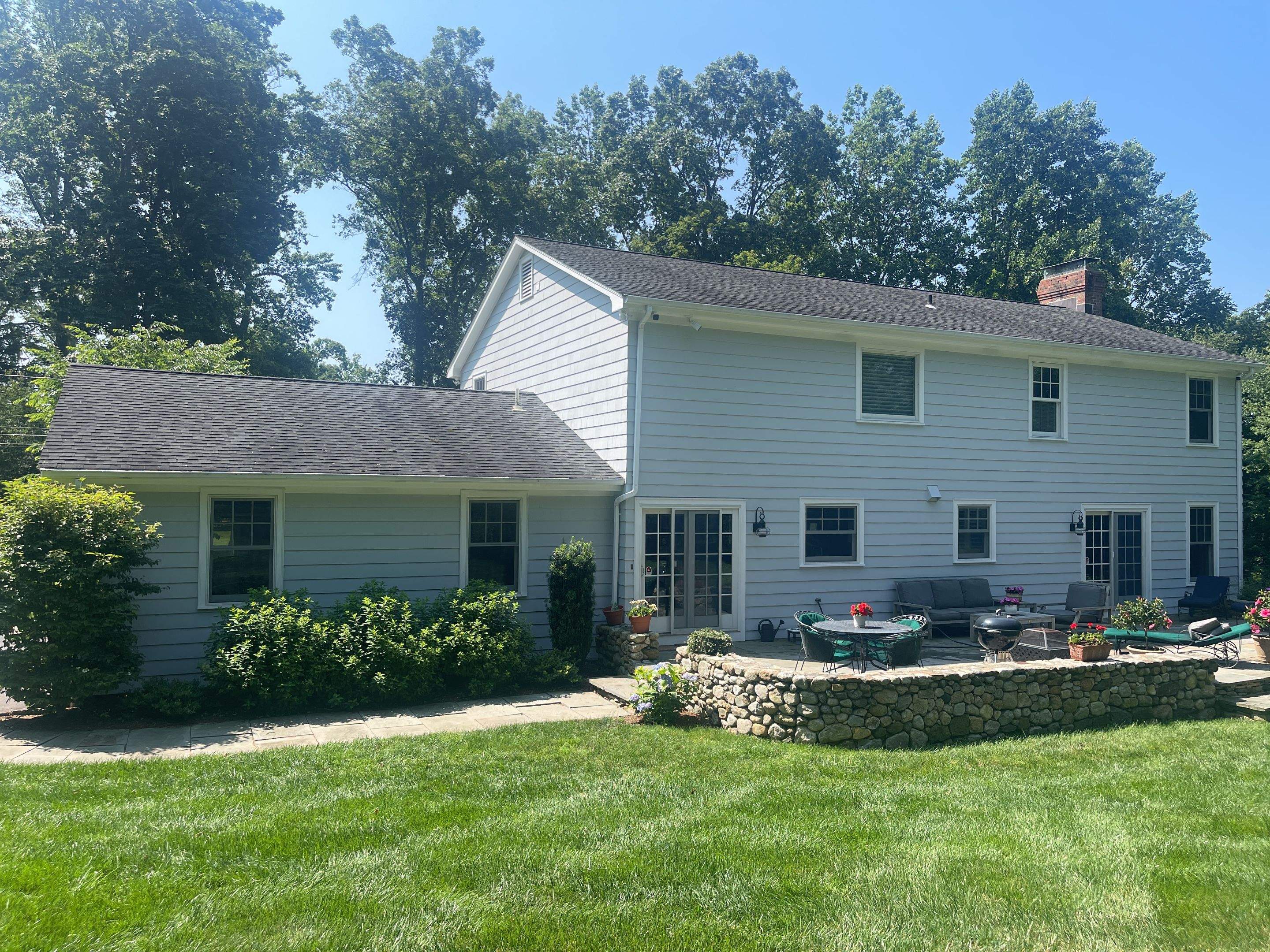 Gutter Installation using White gutters and roof clean up by A Plus Exterior