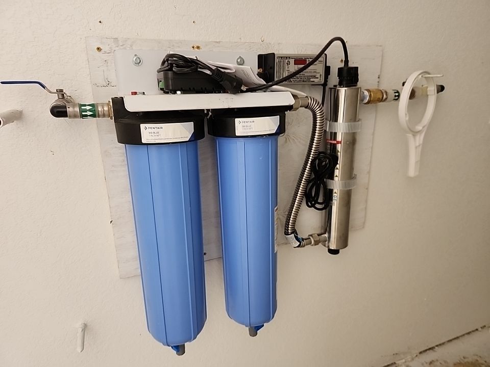 Residential Rainwater Collection System - Pioneer 40K gallon water tank in Mangrove Green by Hill Country Rain Water