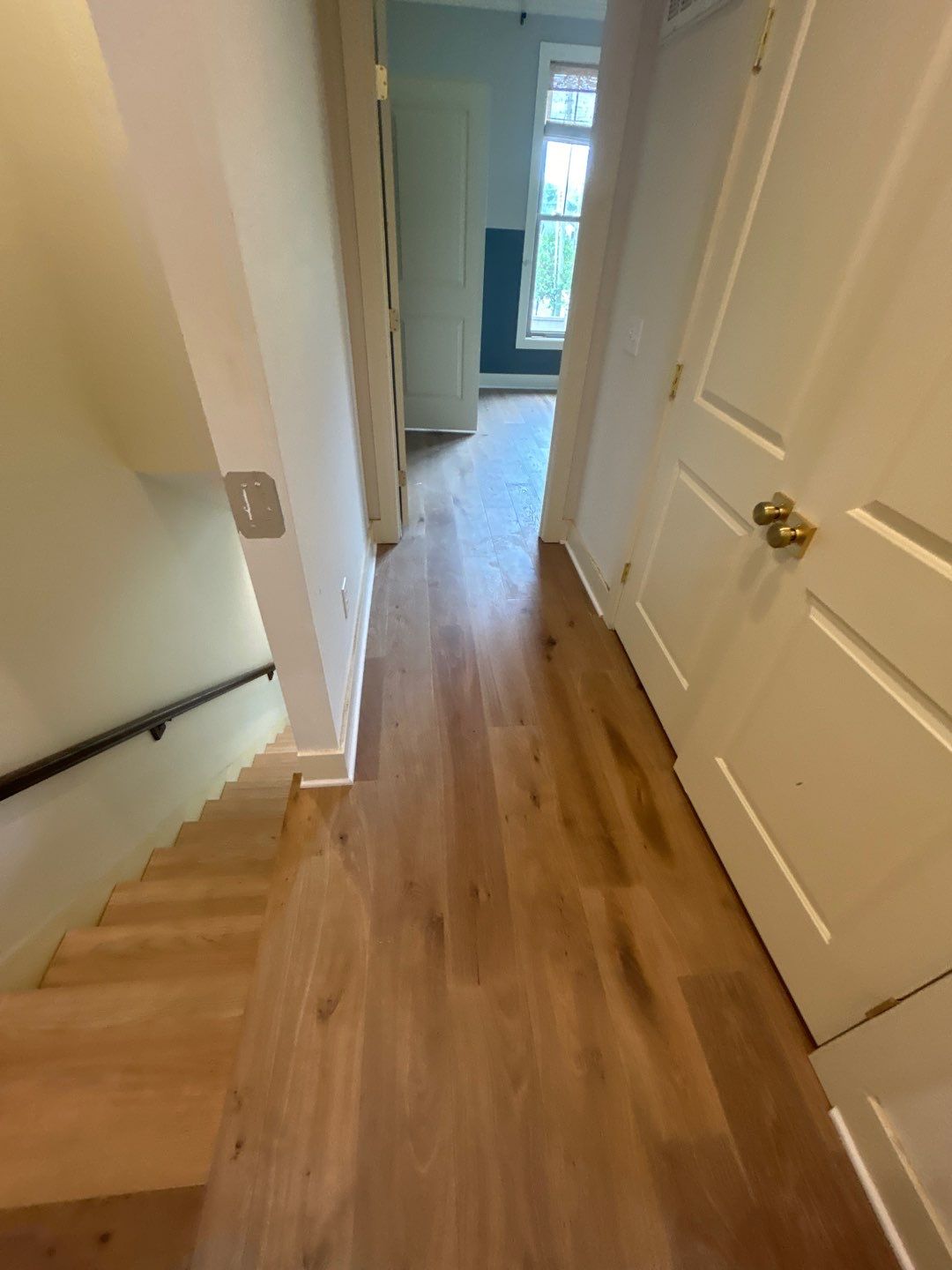 White Oak Hardwood and Checkerboard Tile Installation by Footprints Floors of Nashville