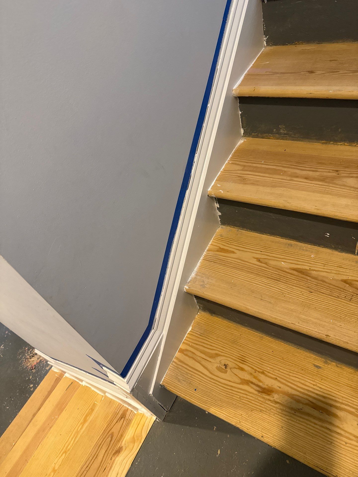 Stairway Installation using t vinyl stair tread and reversibleriser by La Bendicion Contruction Llc