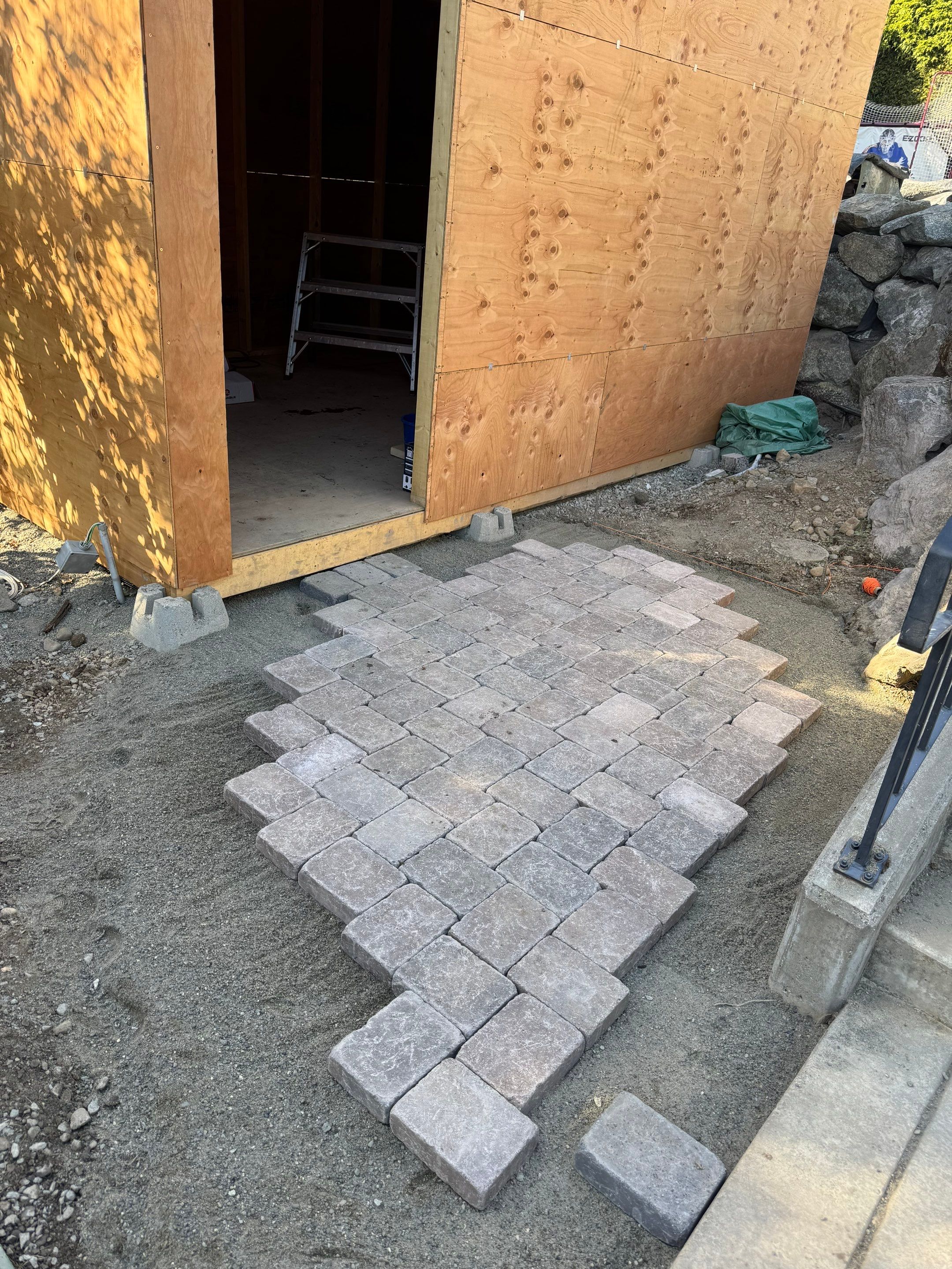 Backyard Transformation — Custom Shed, Paver Patio & Retaining Wall by Habanero Garden and Exterior Care