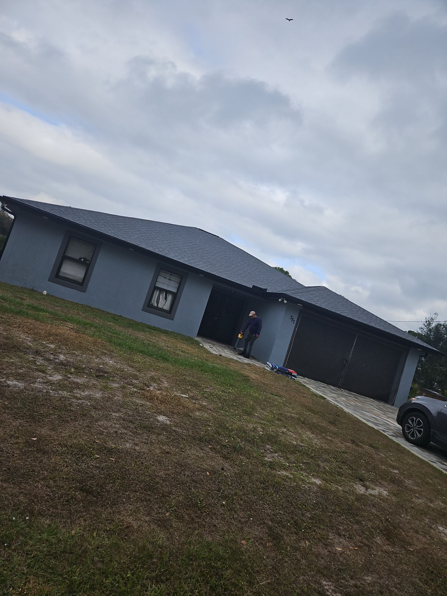 Black Seamless Gutters & Soffit/Fascia in Lehigh Acres FL by Gutter Professors