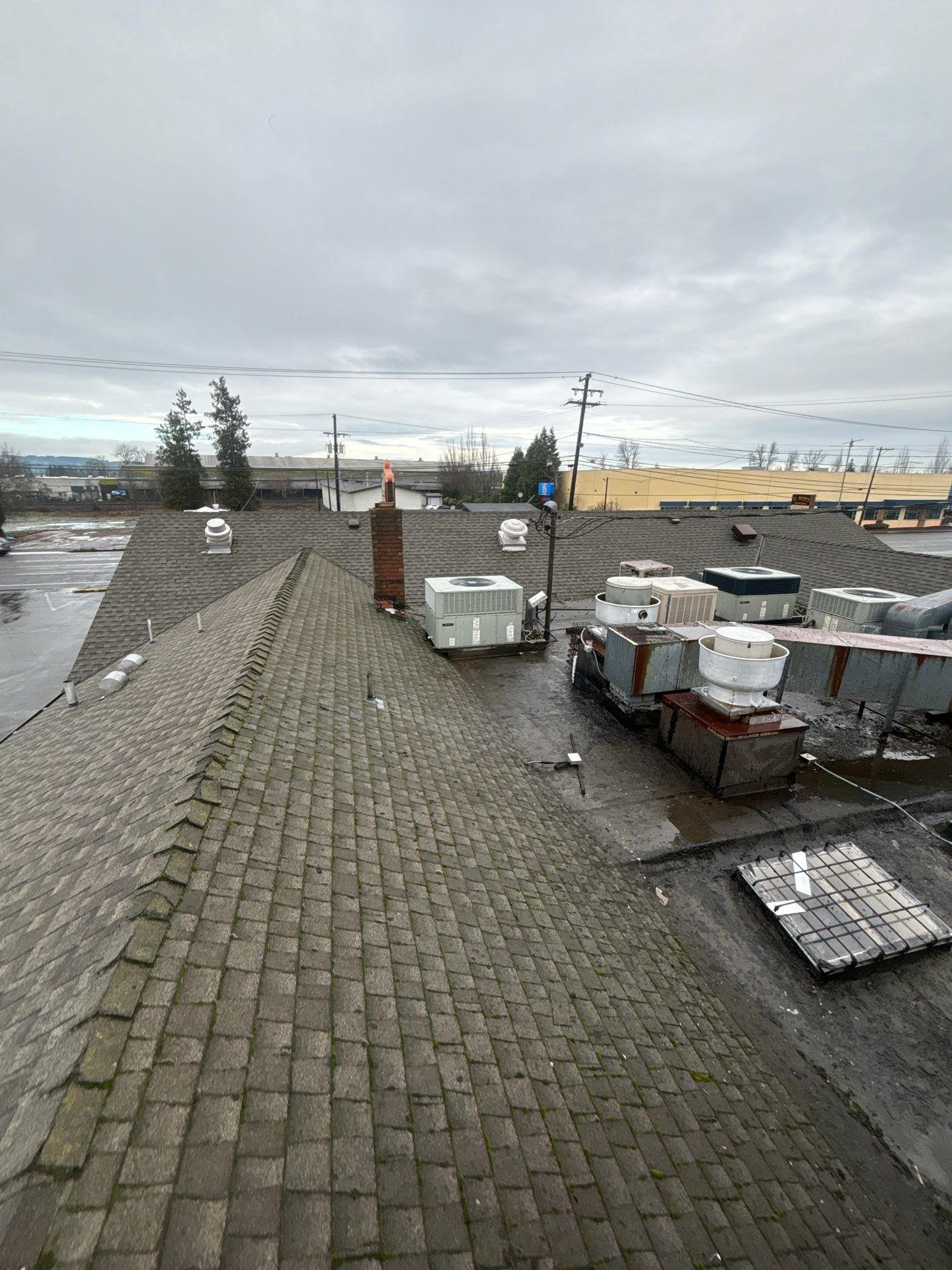 Summit Grey Lum Yun Salem Oregon Commercial Roof by Orezona Building & Roofing Company, Inc.