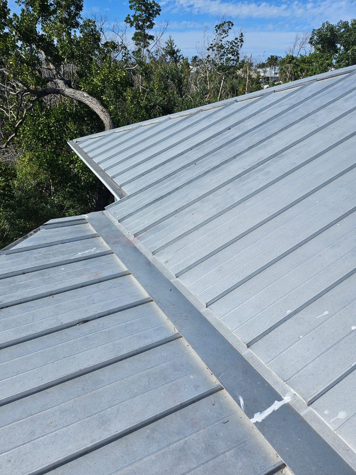 Residential Roofing Repair using Gulf Coast Metals Gulf Seam Panels by Four Peaks Roofing