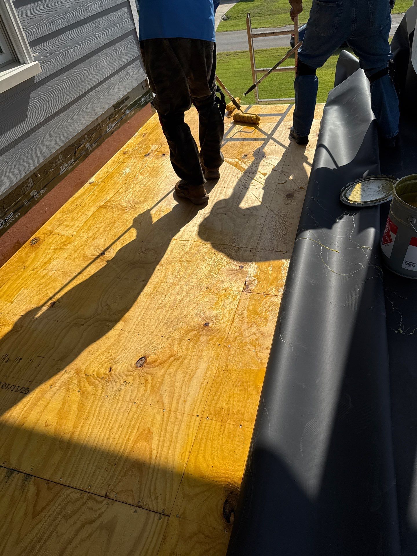 Walk Out Patio Cover by Bayfront Roofing and Construction