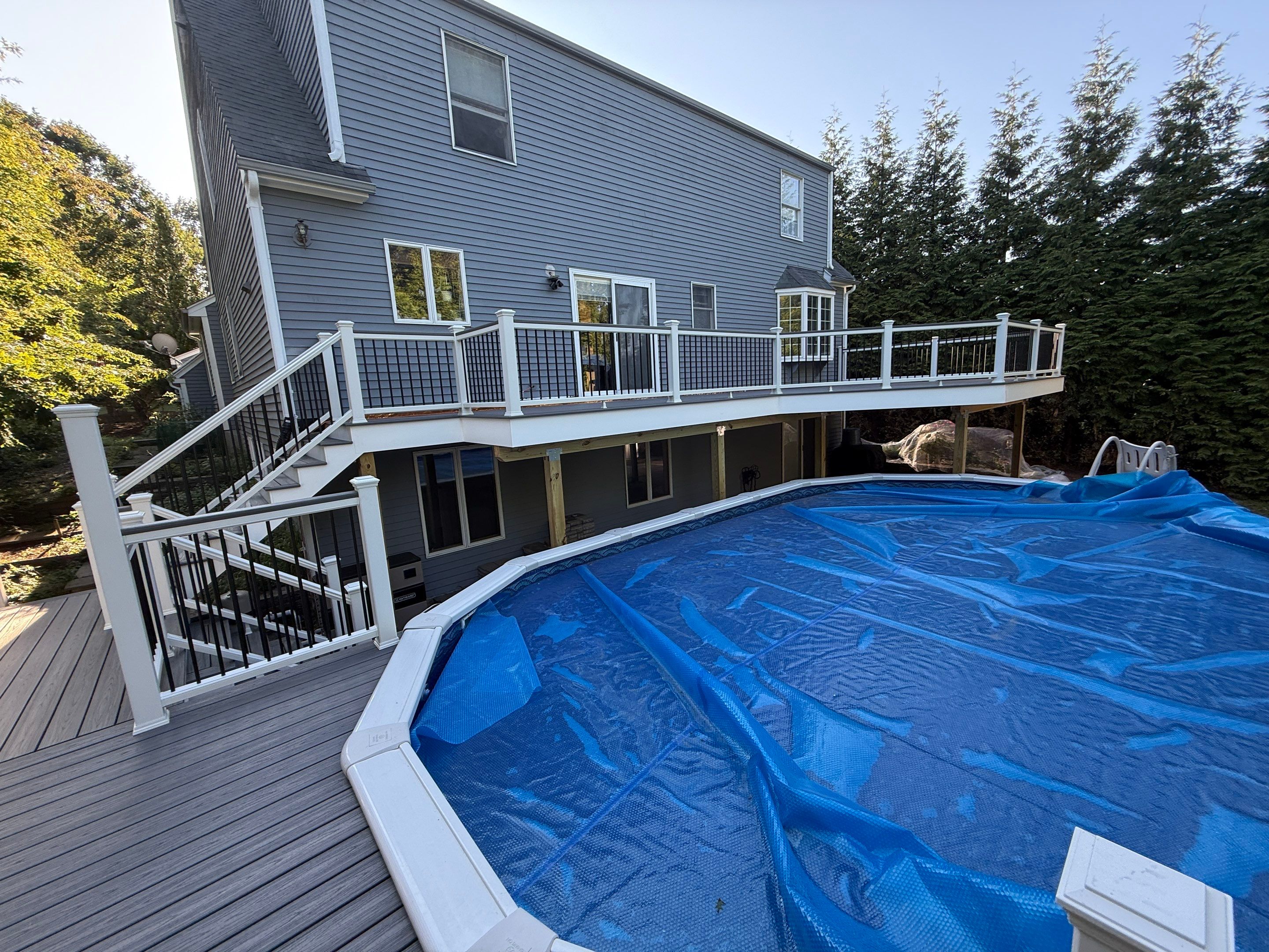 Complete replacement of original deck and addition of new pool deck by DiGiorgi Roofing and Siding Inc