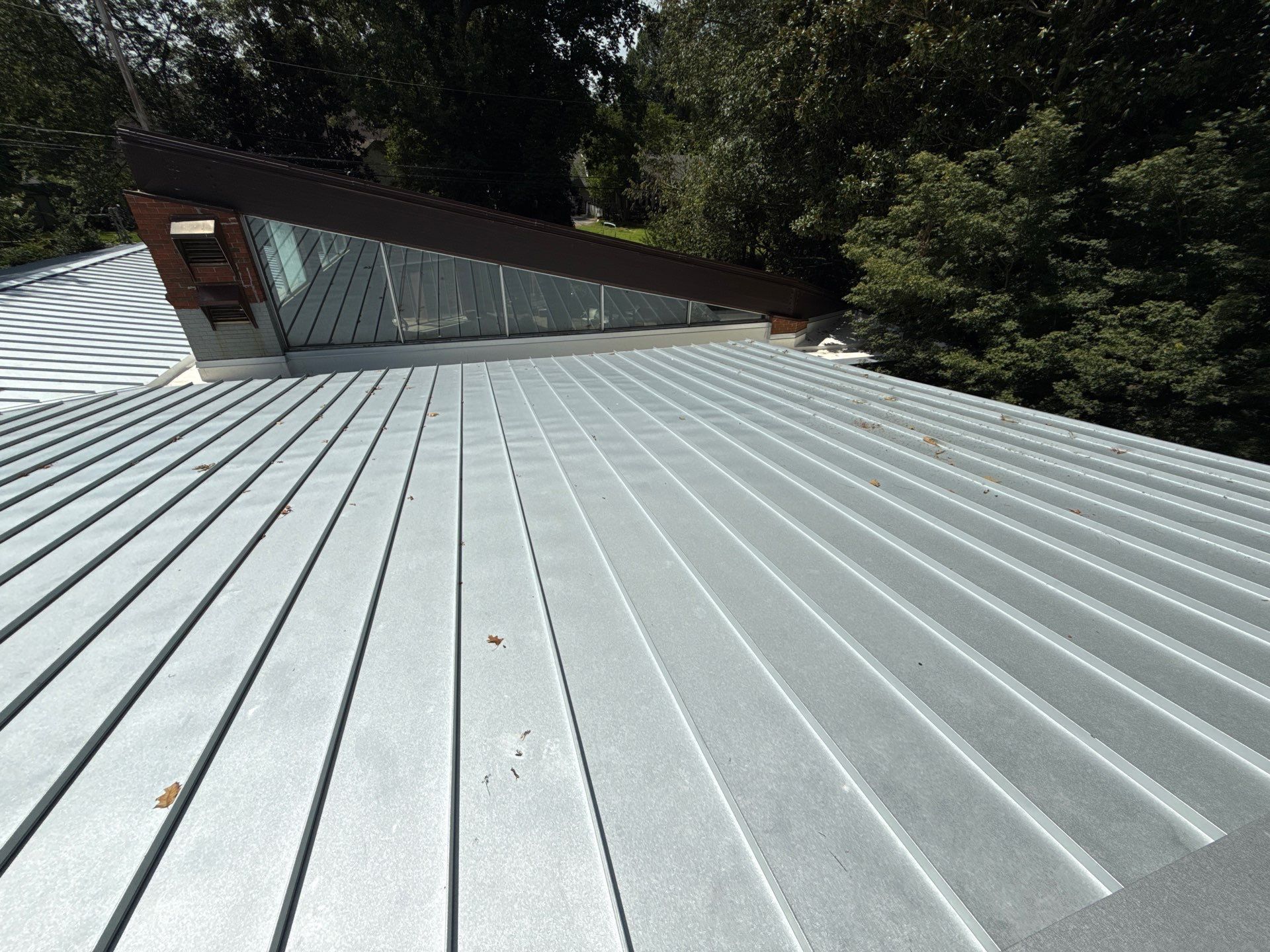 Residential Standing Seam Metal Roof and Membrane Replacement in Memphis by Revival Roofing Services