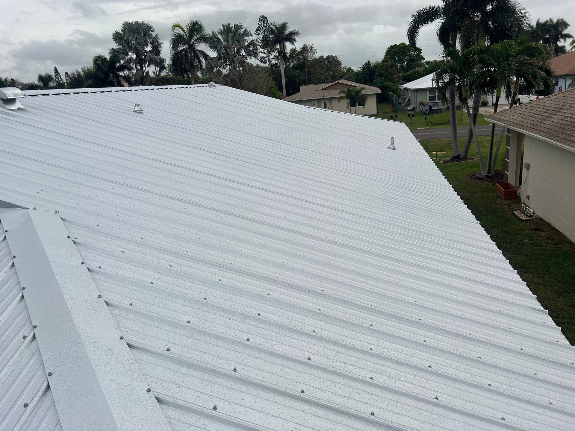 Residential Roofing Installation using Durabull Classic Rib Panel by Durabilis Roofing INC