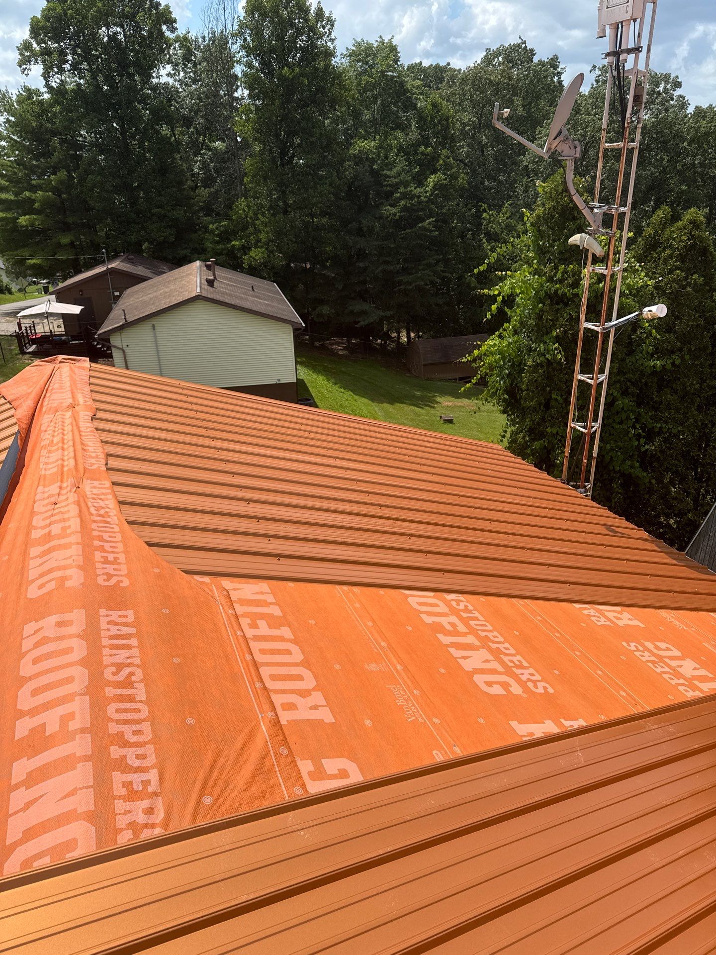 Residential Roofing Installation using Metal by Rainstoppers Roofing
