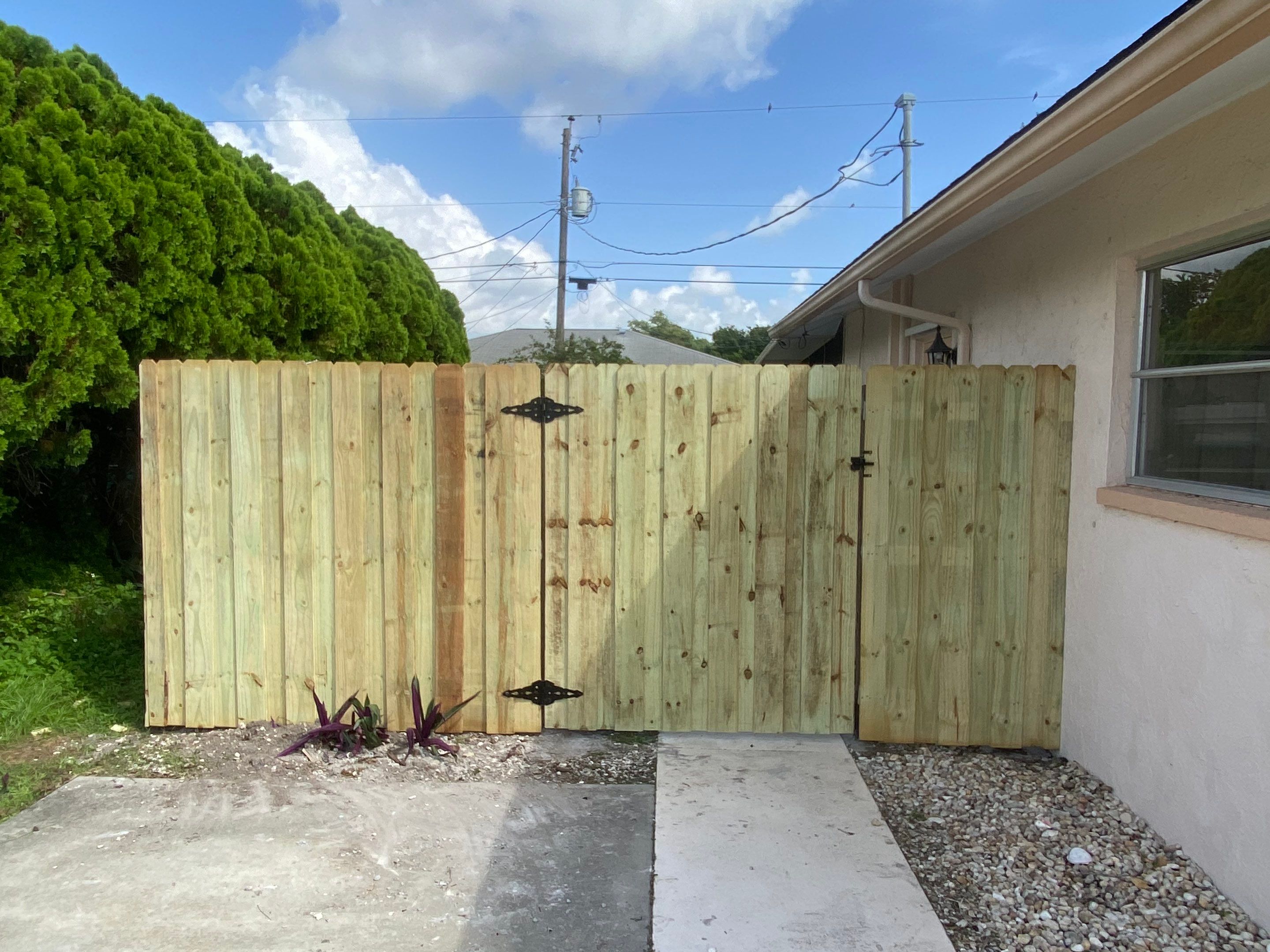 Wood Fence Installation using Board on Board Wood Fence by Asap fence and gates, LLC